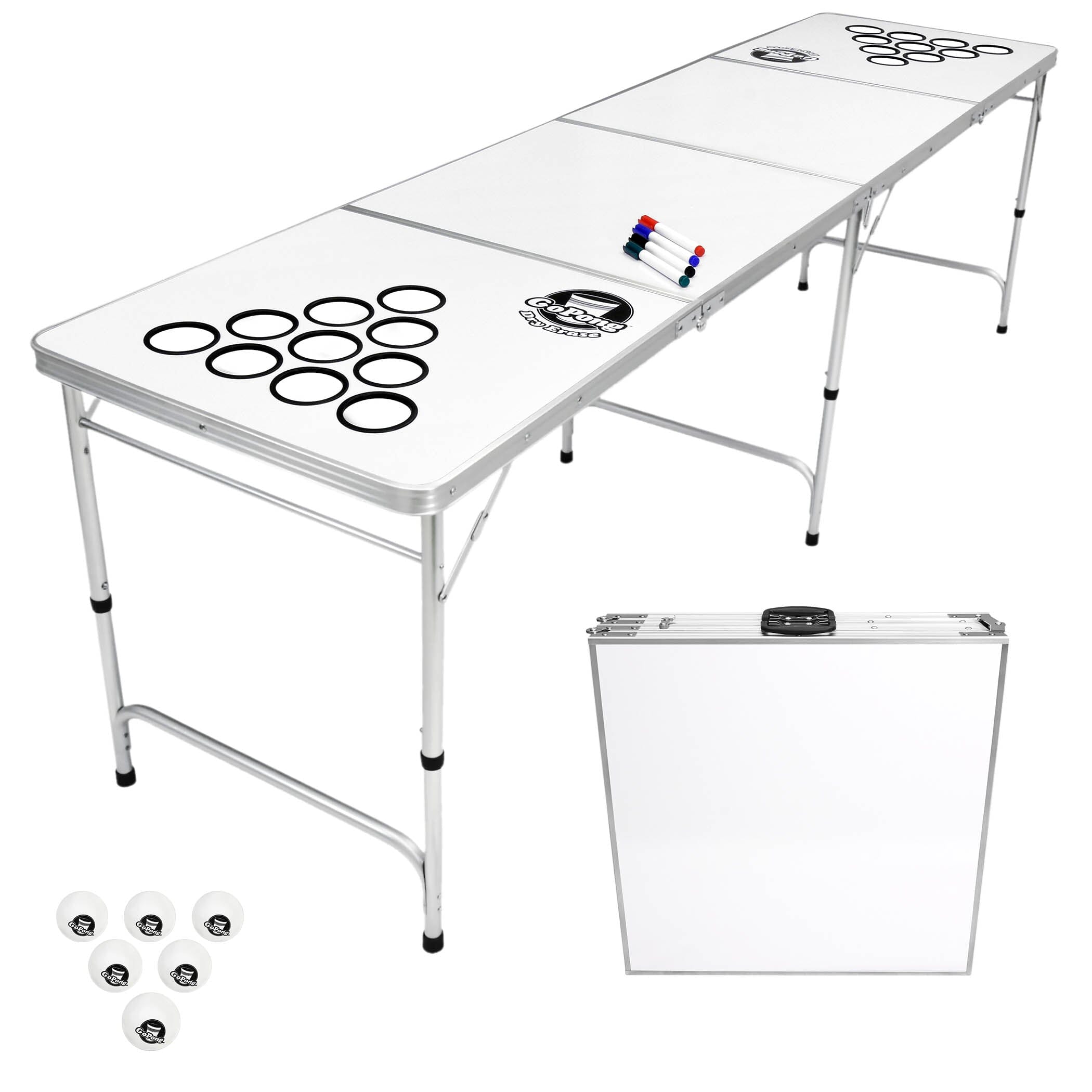 White dryeraser table with markers on top 6 white table tennis balls and a folded table