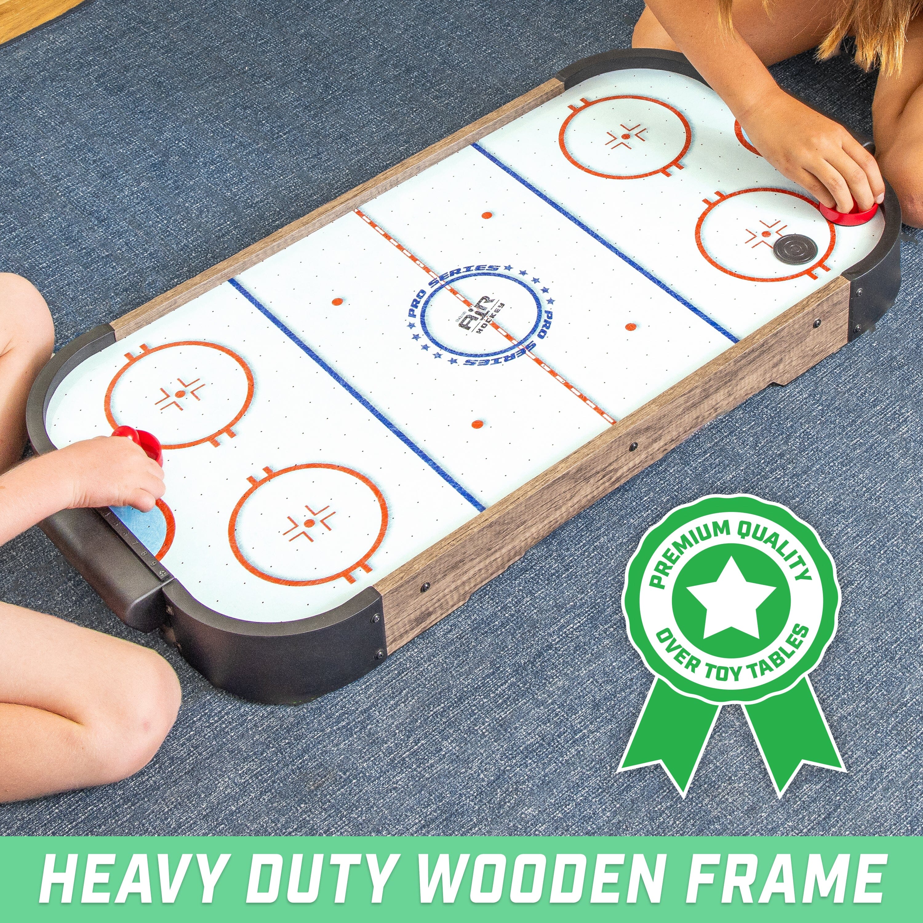 a young girl playing with a hockey board