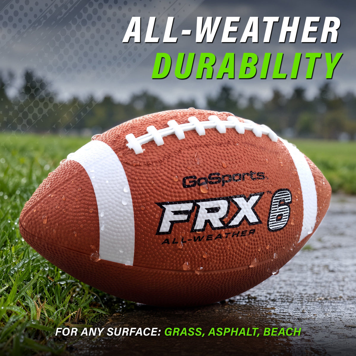Wet GoSports FRX 6 all-weather rubber football on grass by a puddle, made for grass, asphalt & beach