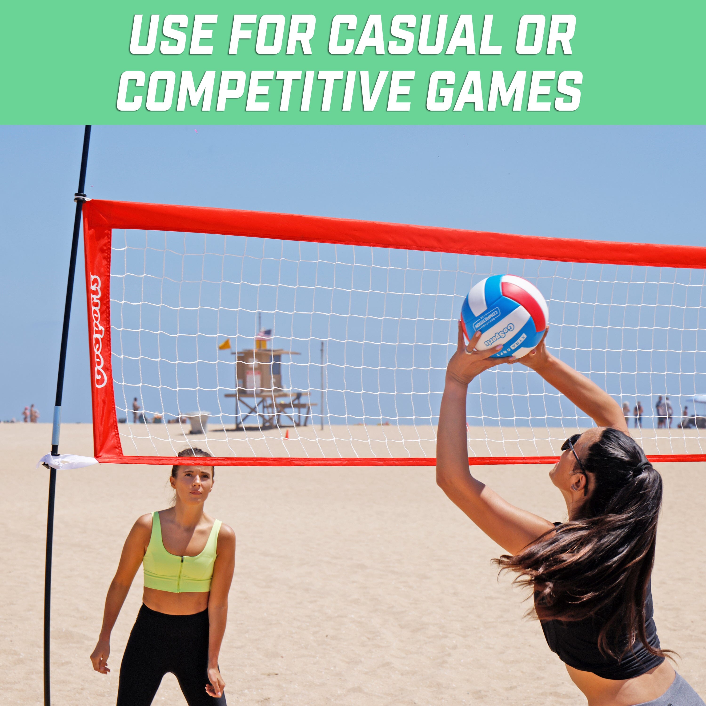 a woman is playing volleyball on the beach