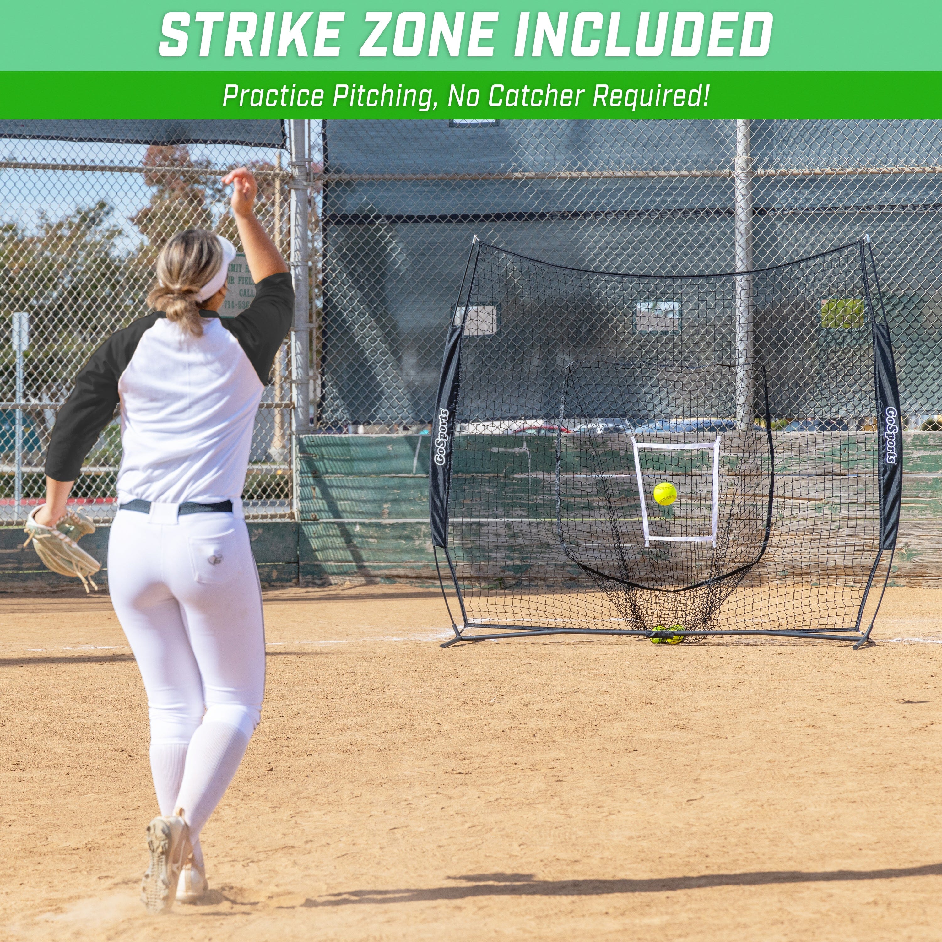 a woman swinging a bat at a softball game