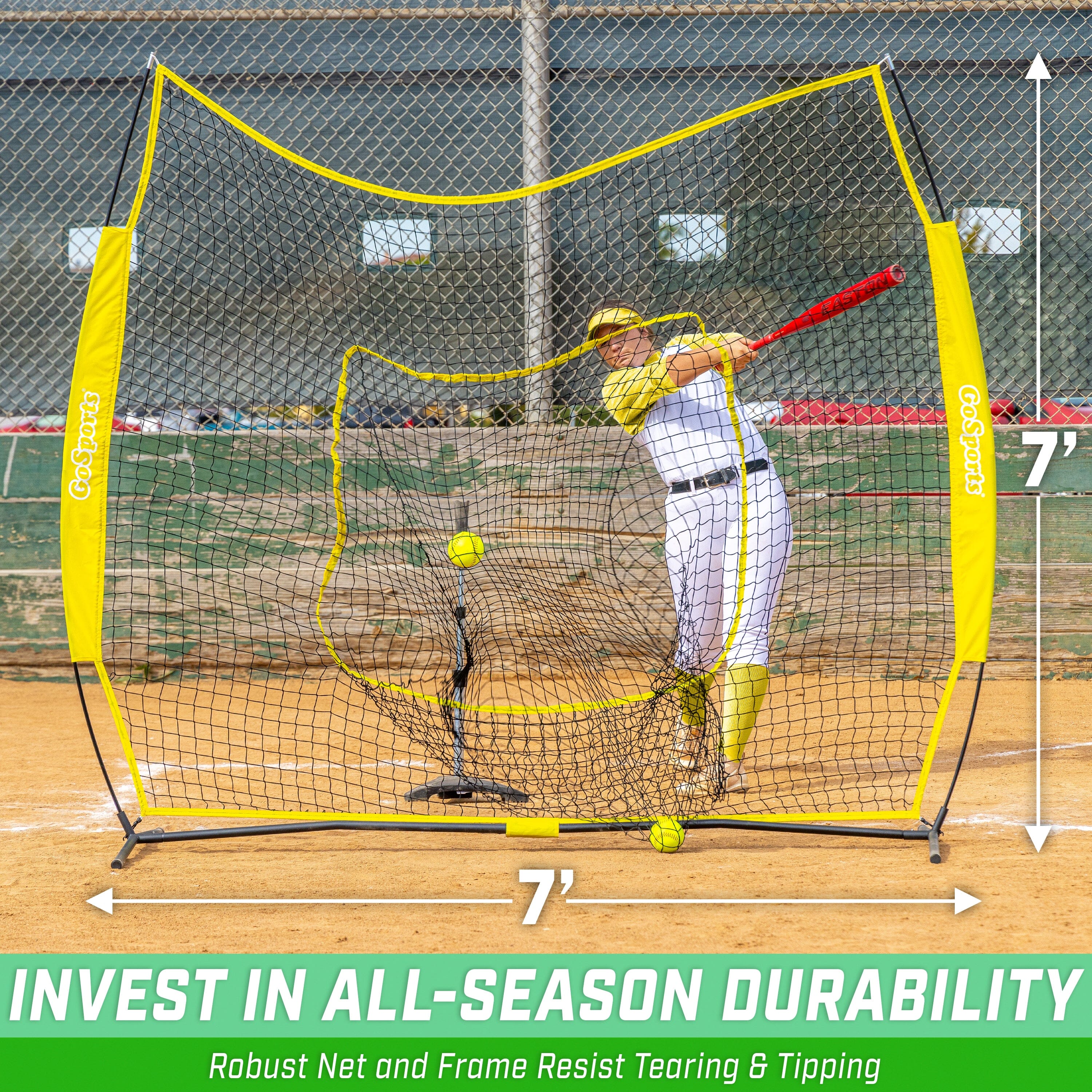 a baseball player swinging a bat at a ball