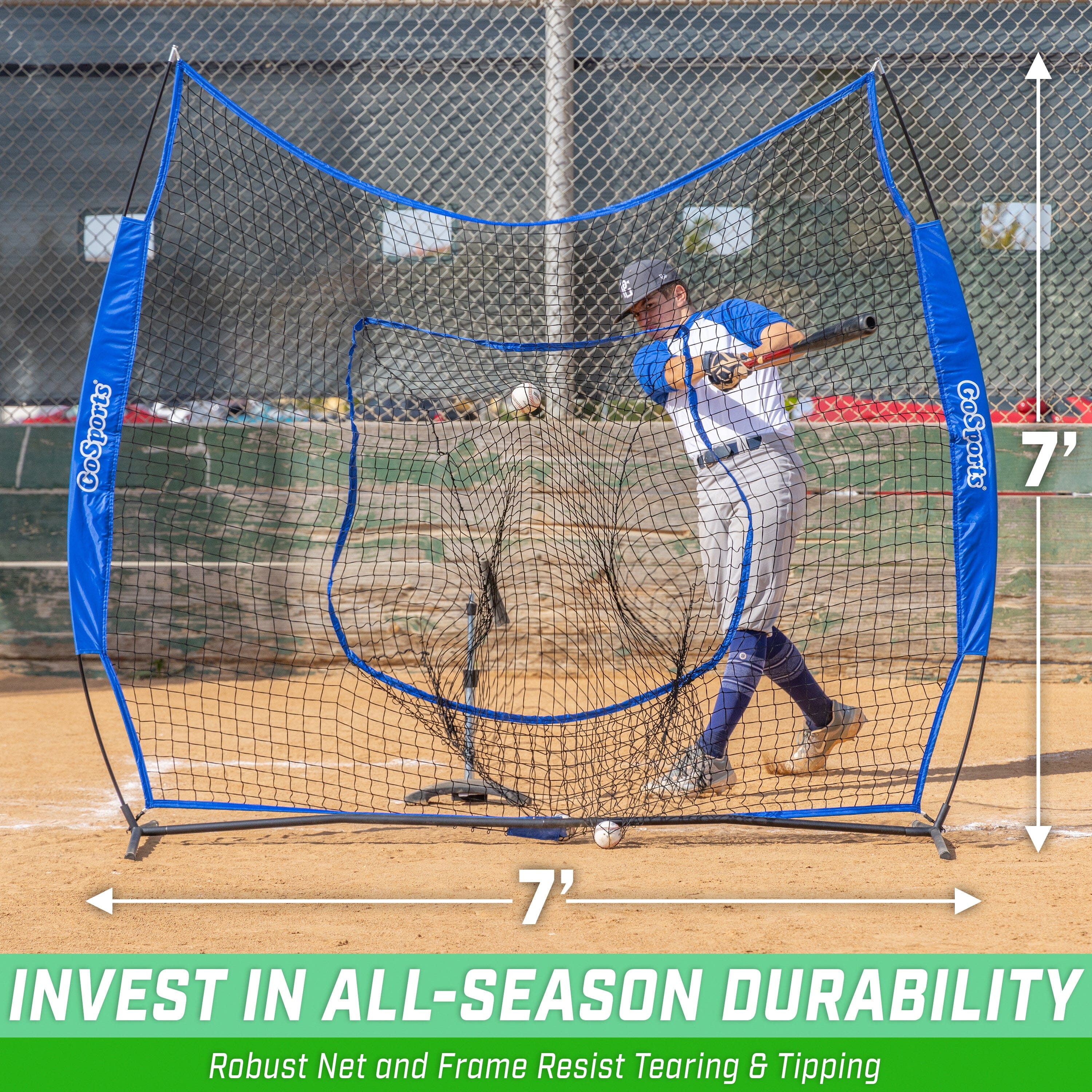 a baseball player swinging a bat at a ball