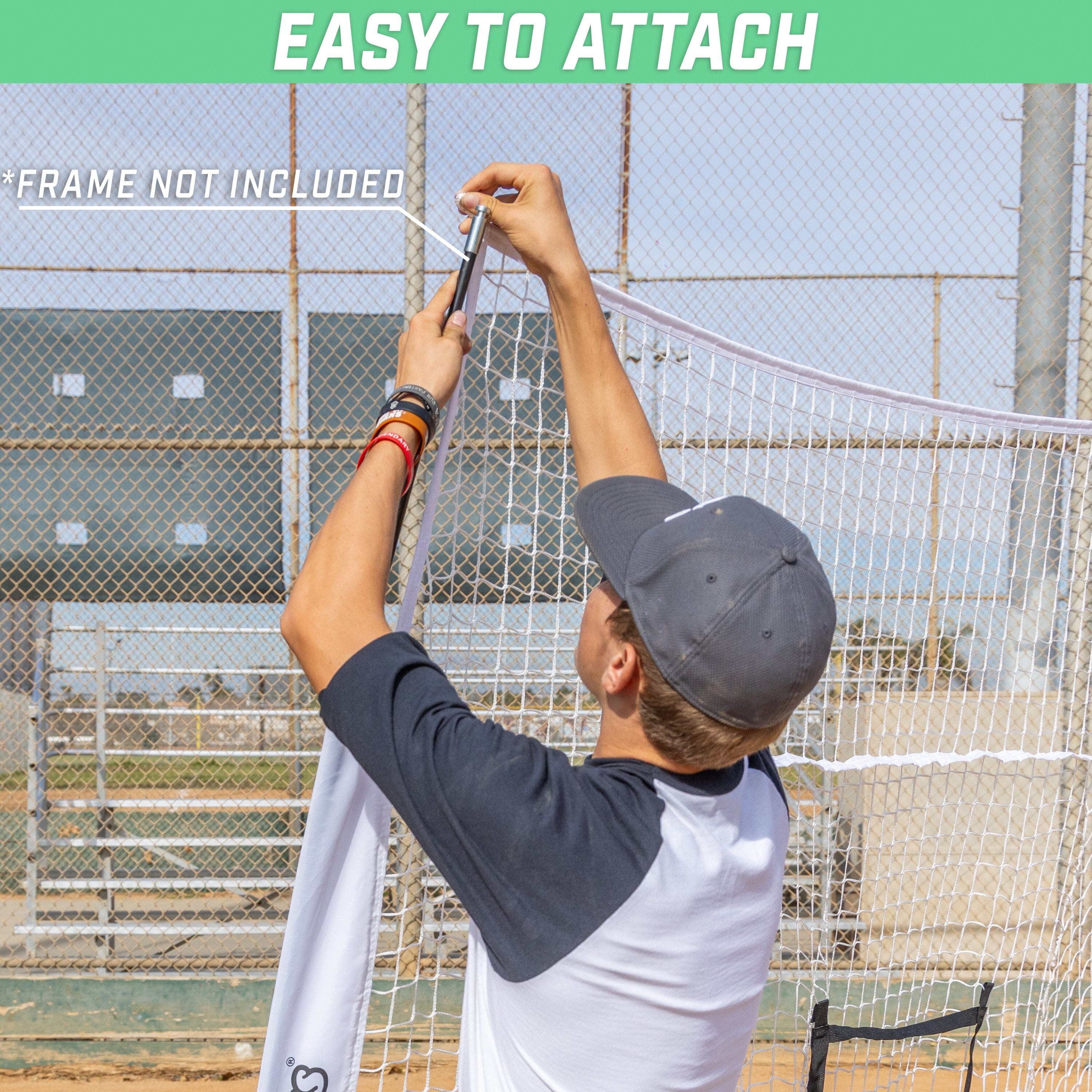 a man holding a baseball bat on a baseball field