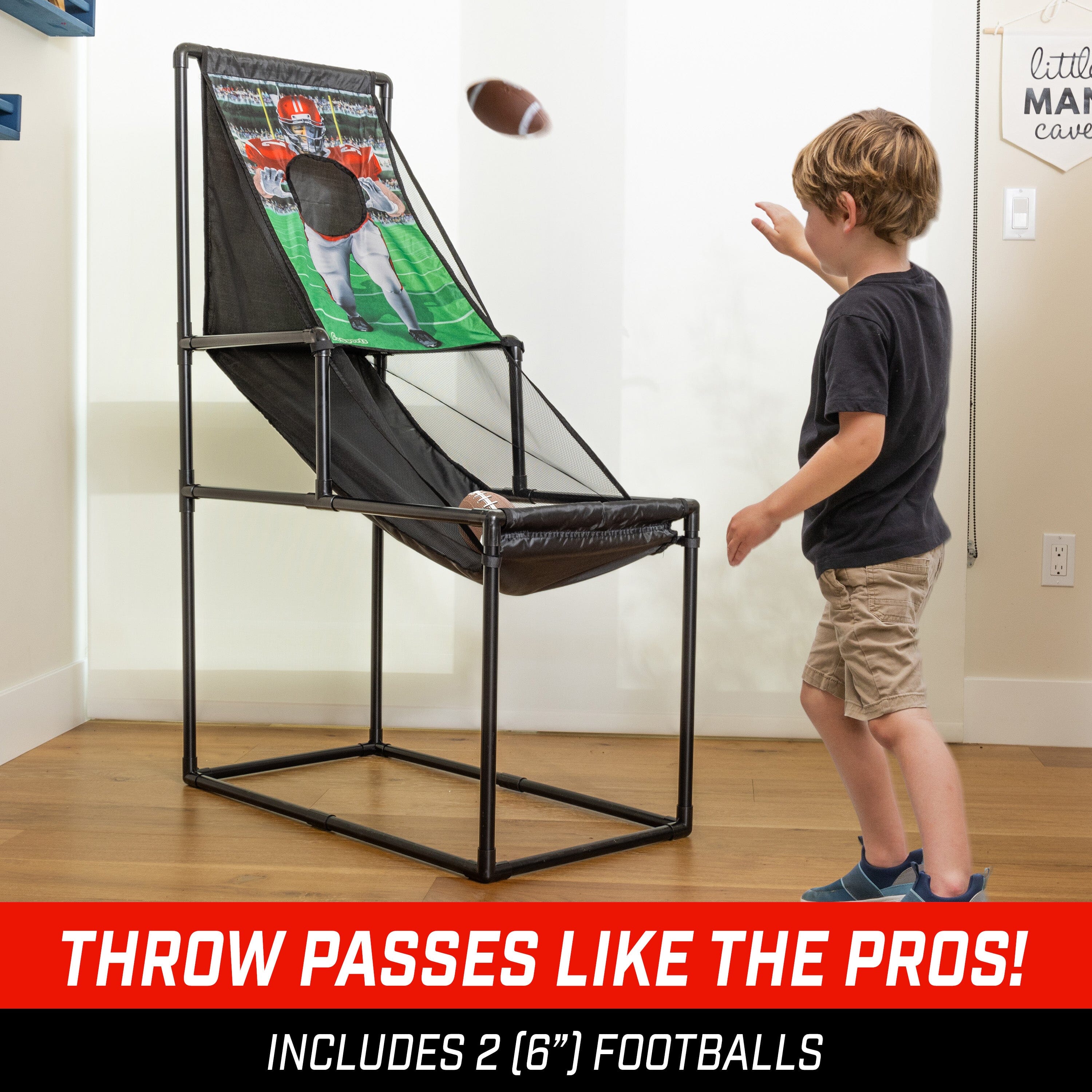 a young boy playing with a football game