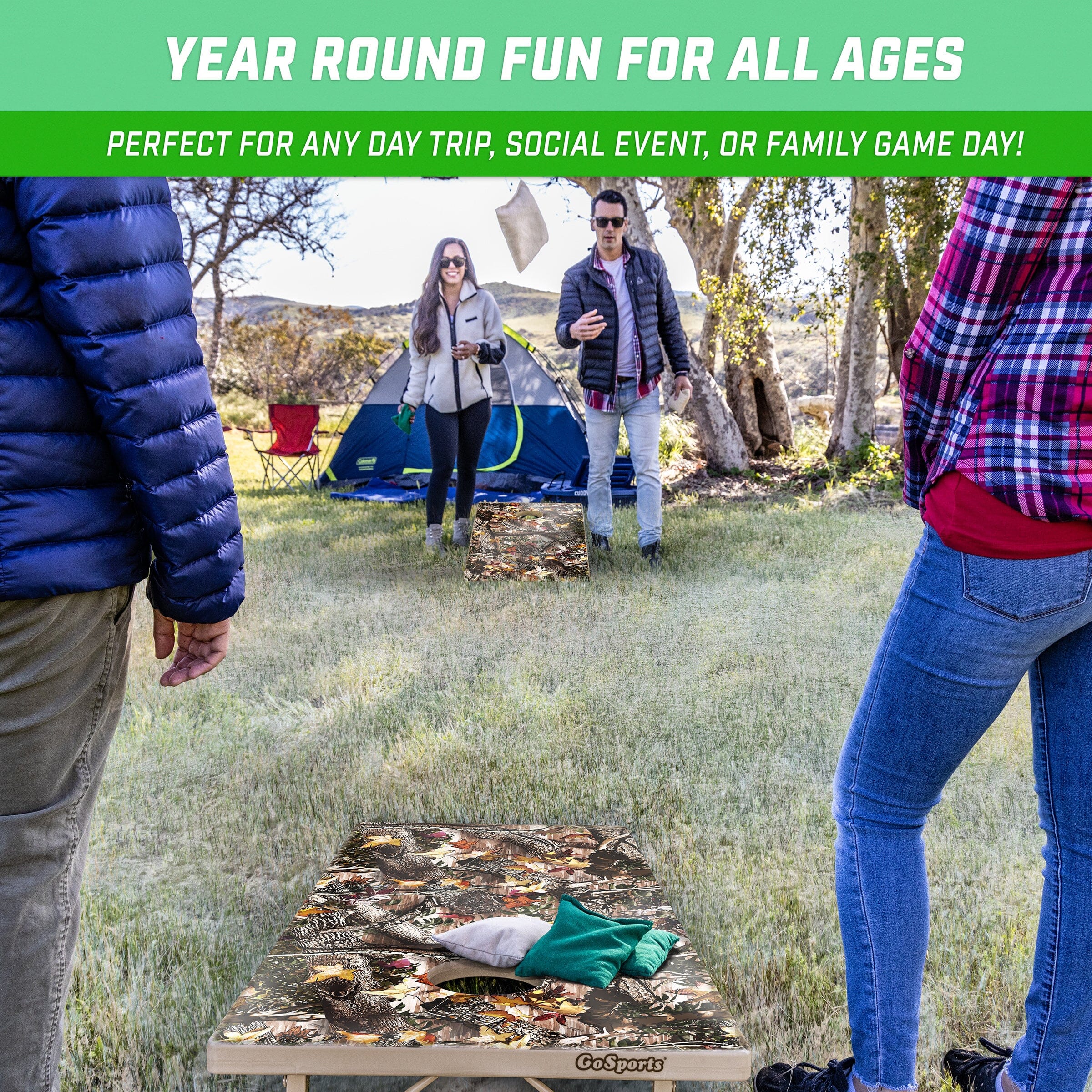 a group of people standing around a box of leaves