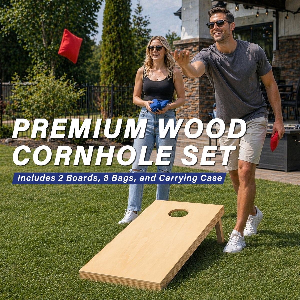 Friends playing cornhole on a natural wood GoSports board in a backyard, red bag mid-toss, set includes 2 boards & 8 bags
