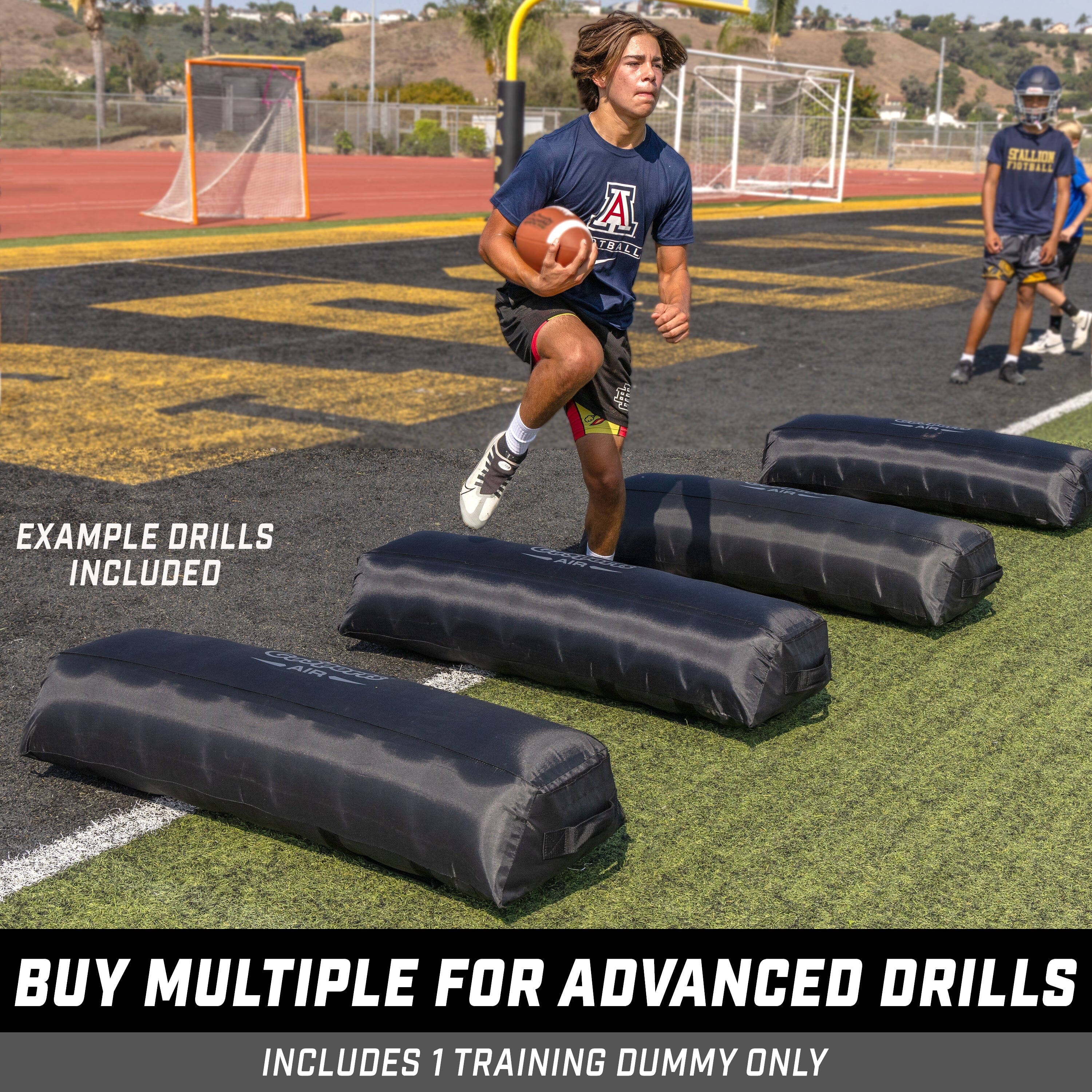 man stepping over inflatables