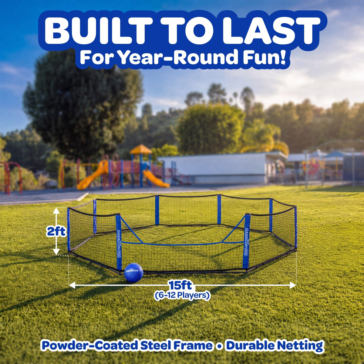 Outdoor octagonal safety net playpen on a grassy playground, with blue posts and black netting. Large text at the top reads 'BUILT TO LAST For Year-Round Fun!' and measurement callouts show 15ft width, 2ft height, and 6-12 players.