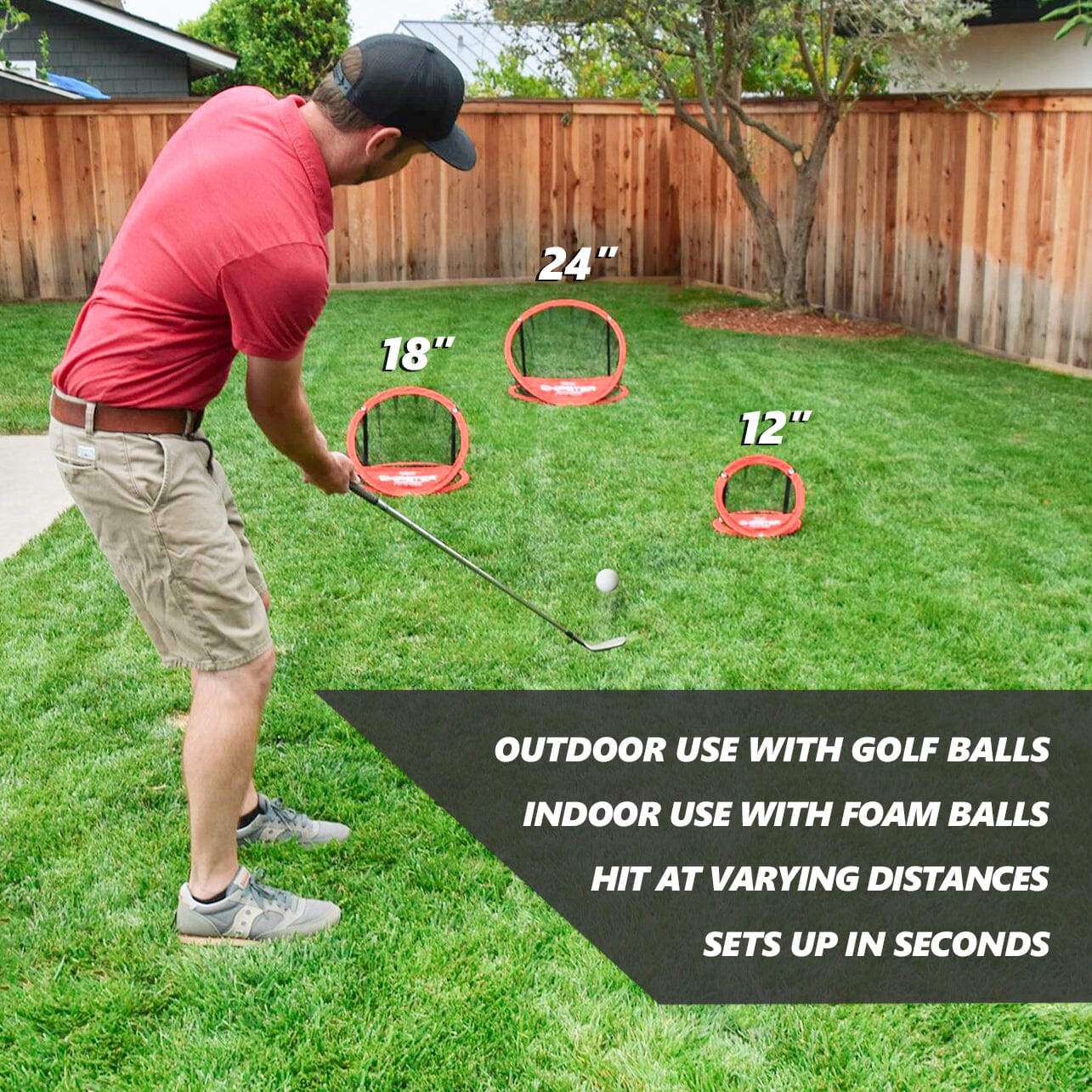 a man is putting a golf ball into a hole