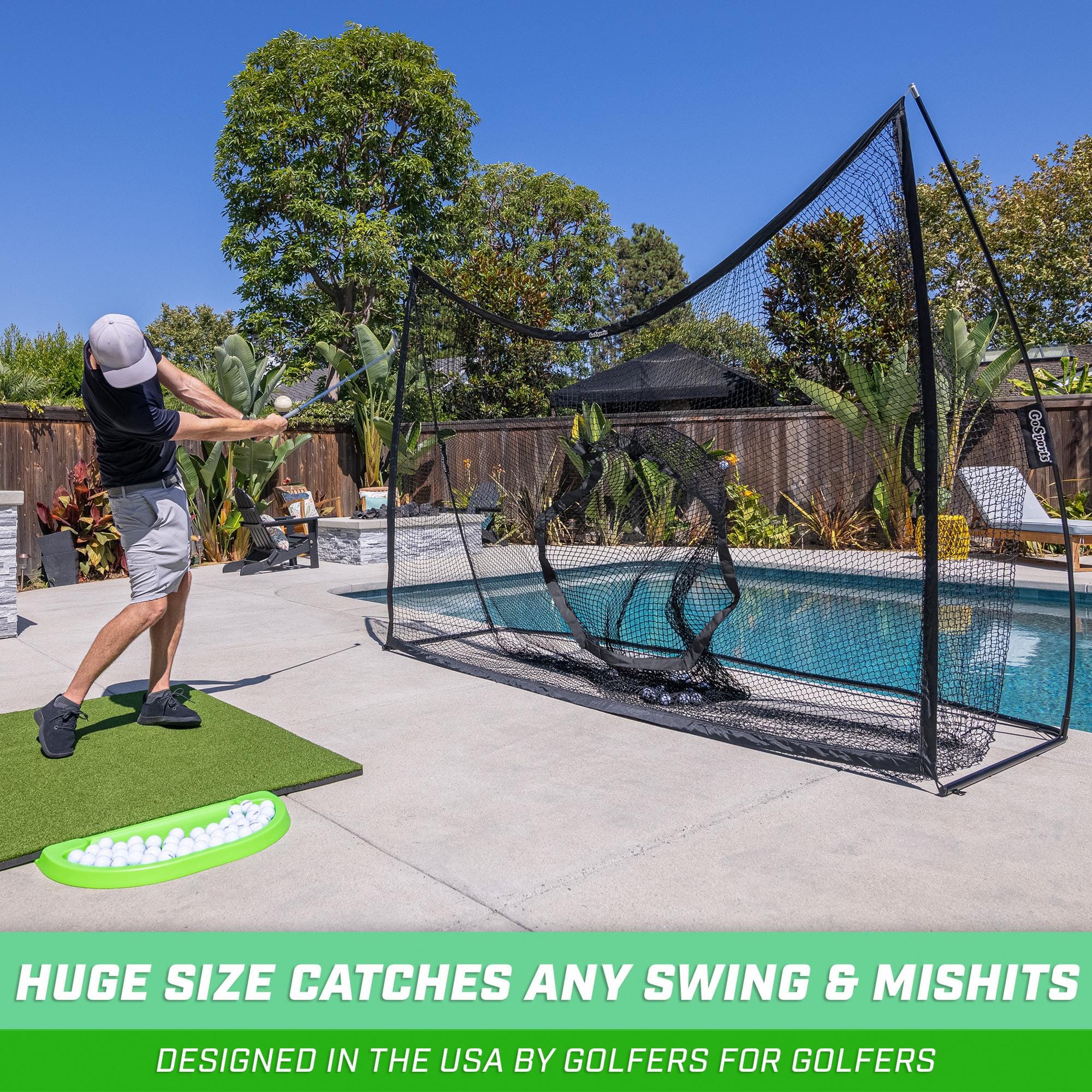 a man is playing with a golf net