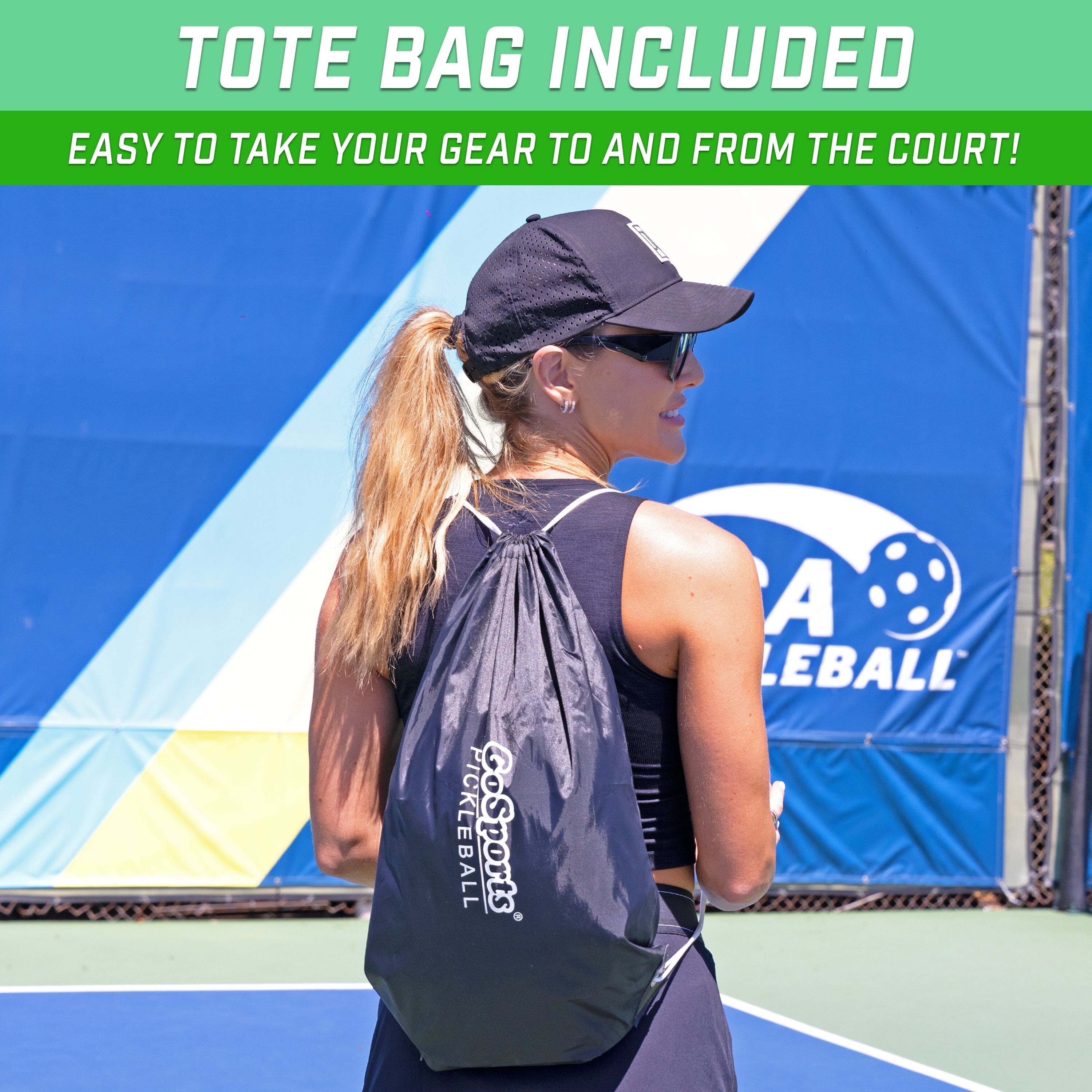 a woman holding a tennis rad on a tennis court