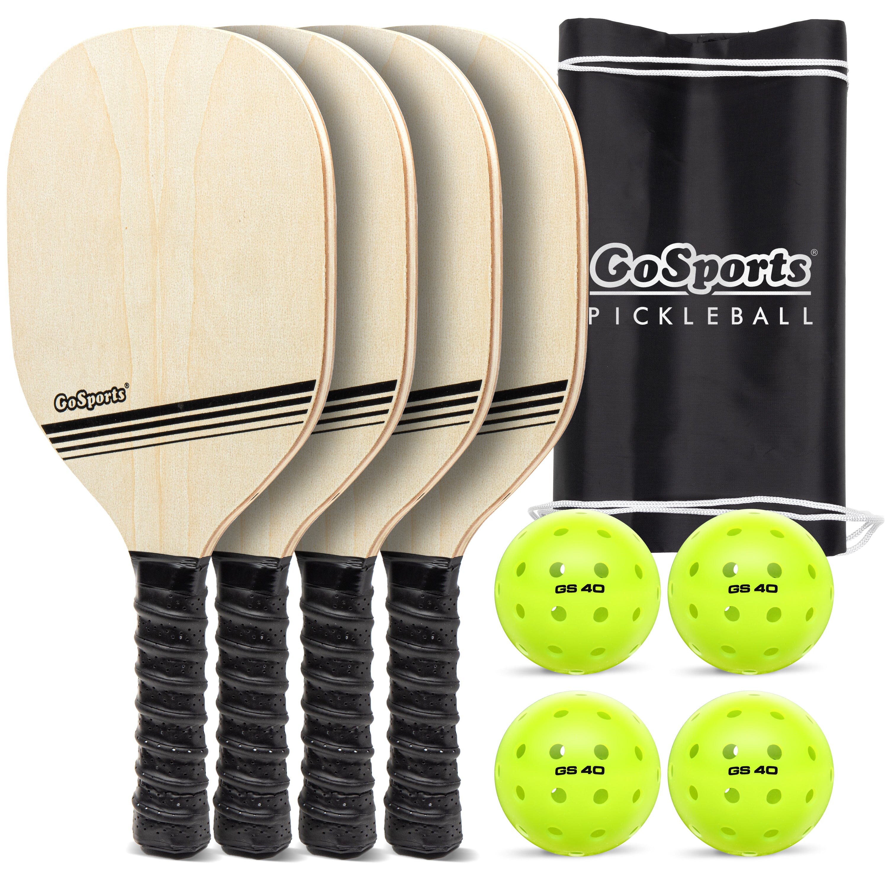 a set of four paddles and a bag of balls