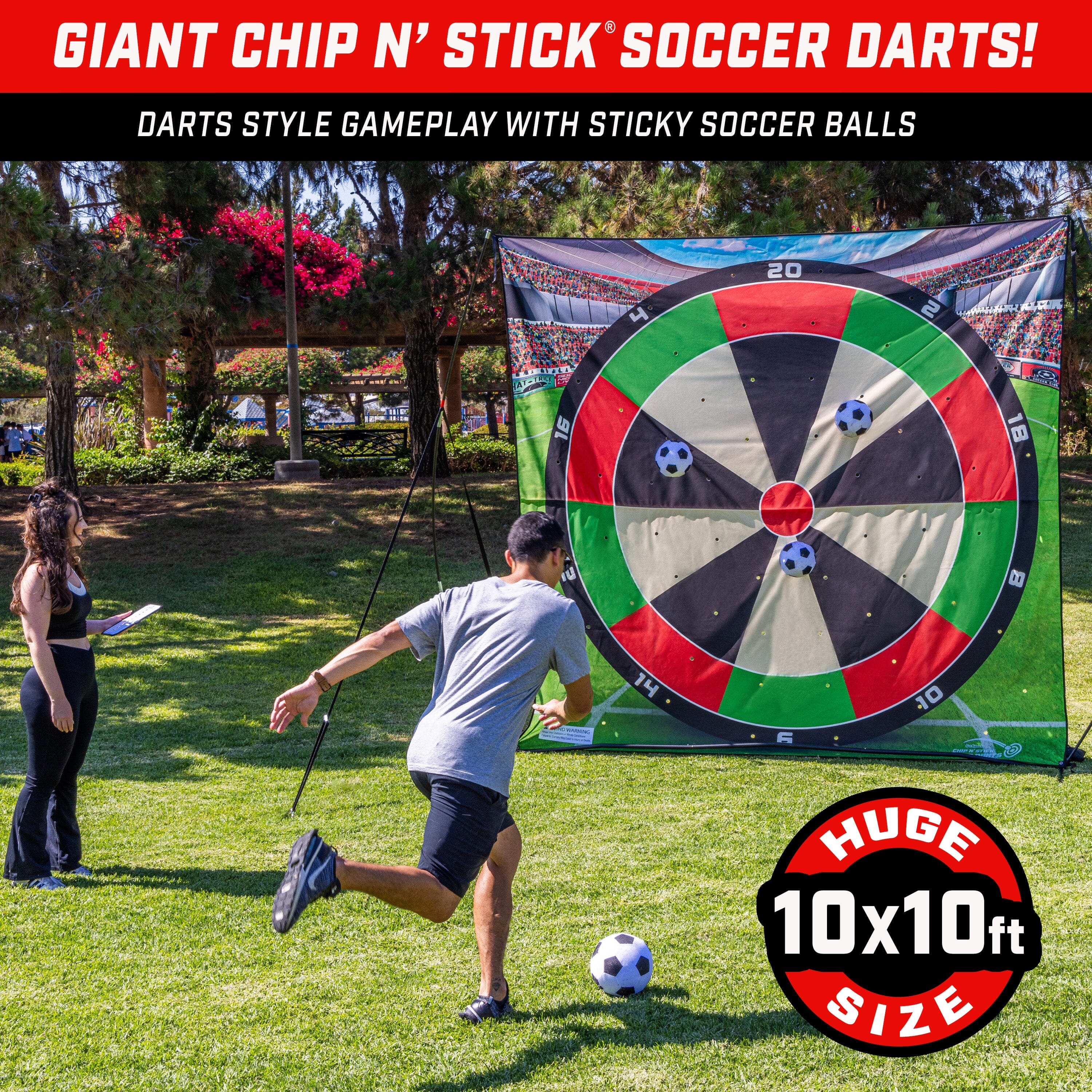 a man kicking a soccer ball with a giant dart