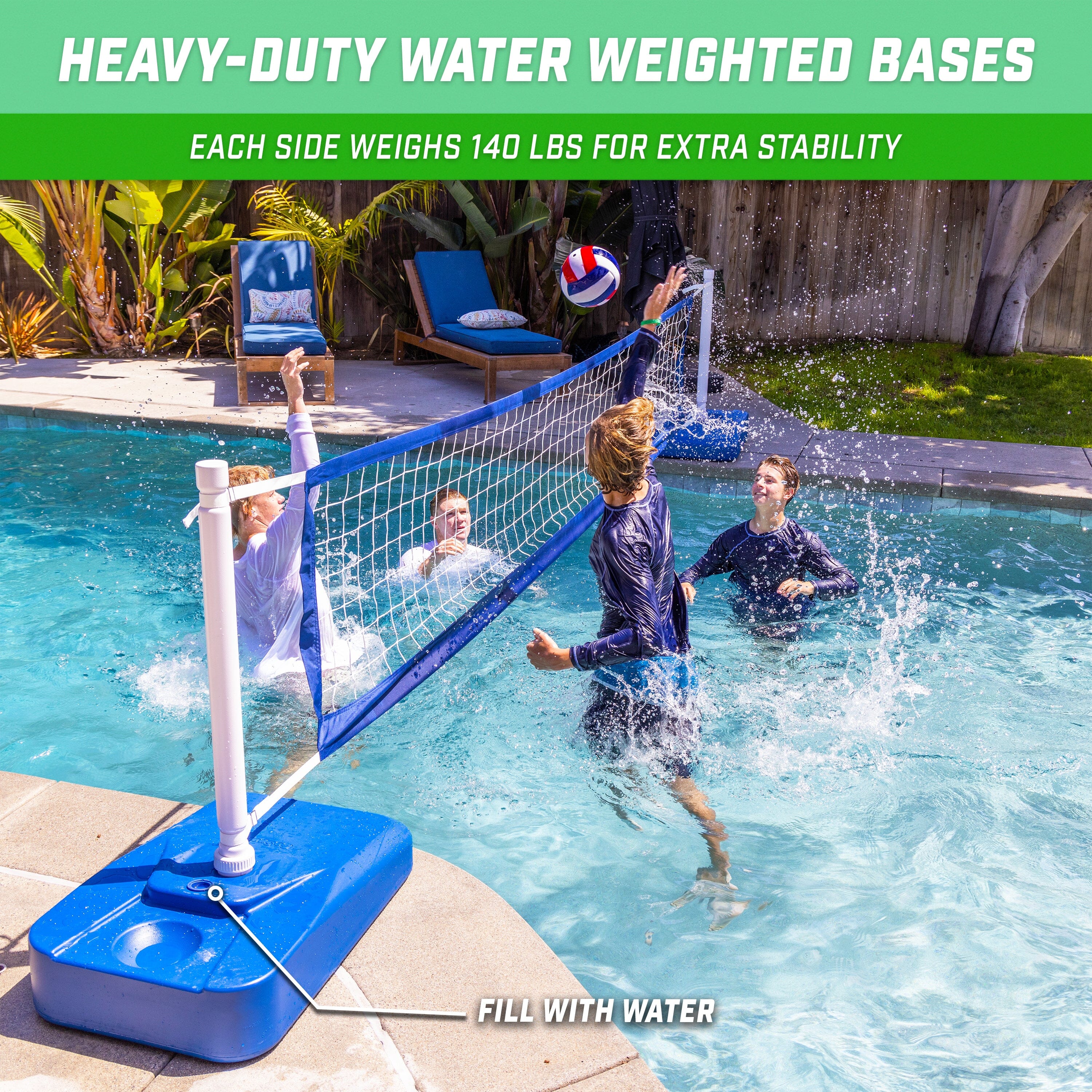 a grou pof boys playing volleyball in a pool