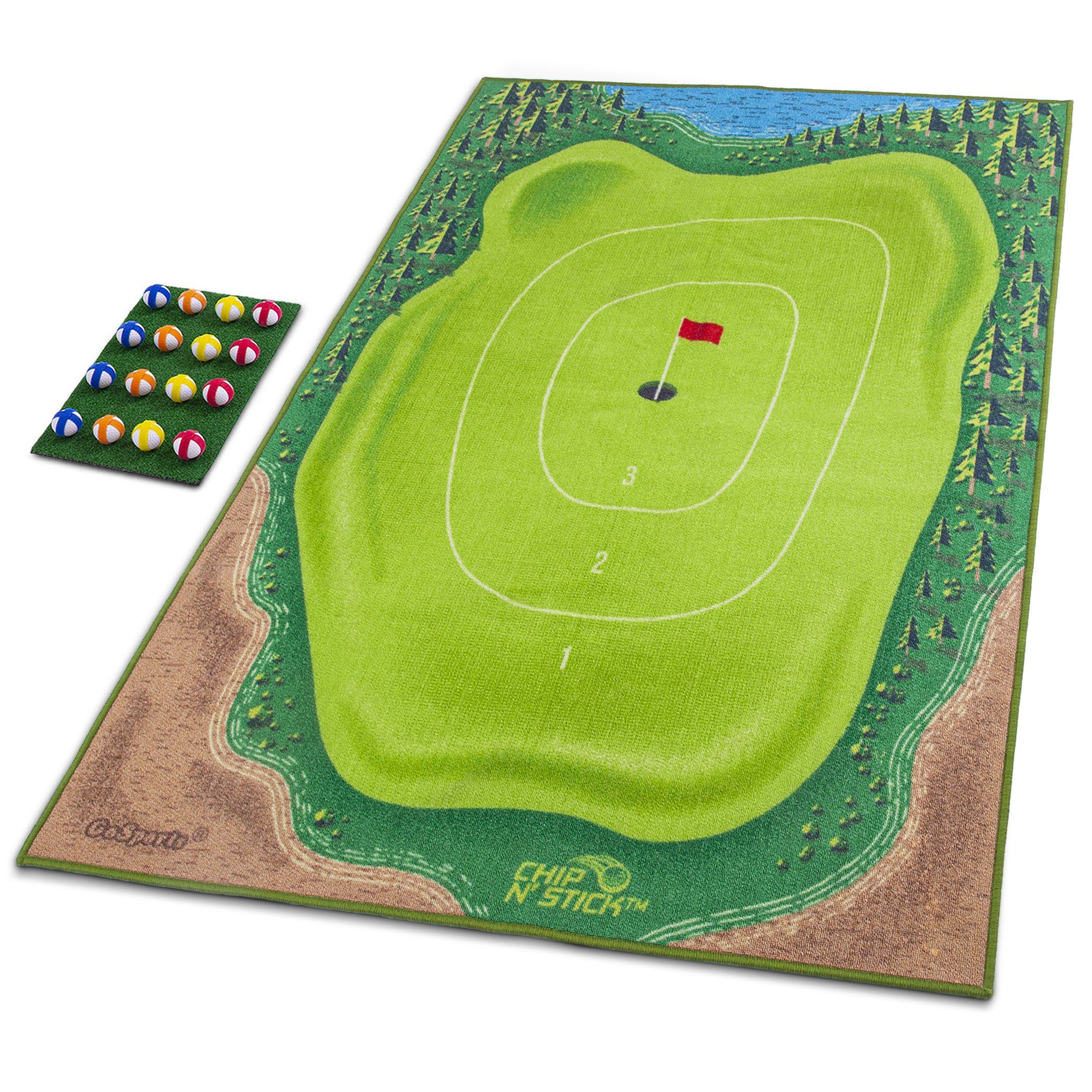 a golf mat with a hole and four balls