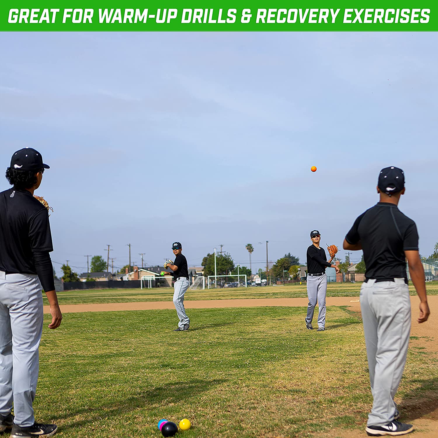 a group of men playing baseball on a field