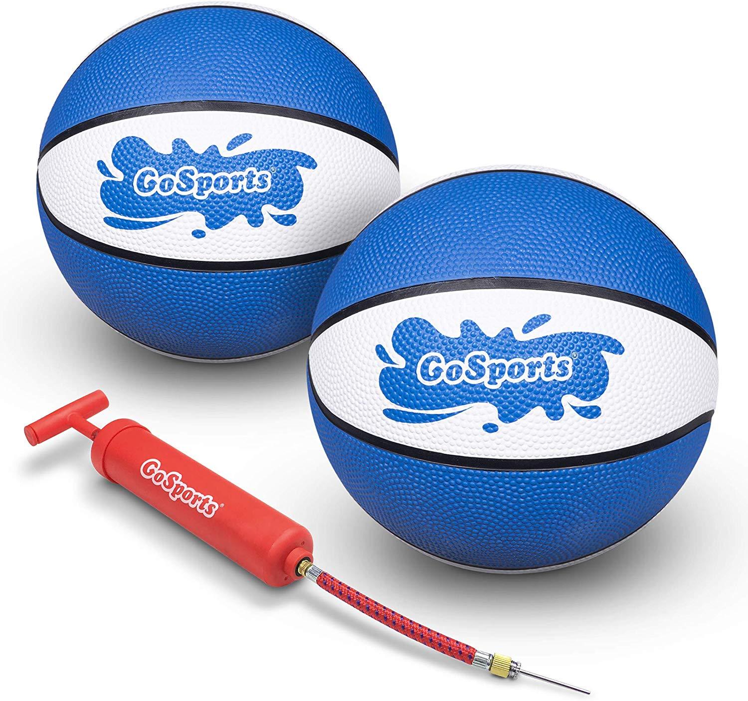 two blue and white basketball balls with a red marker