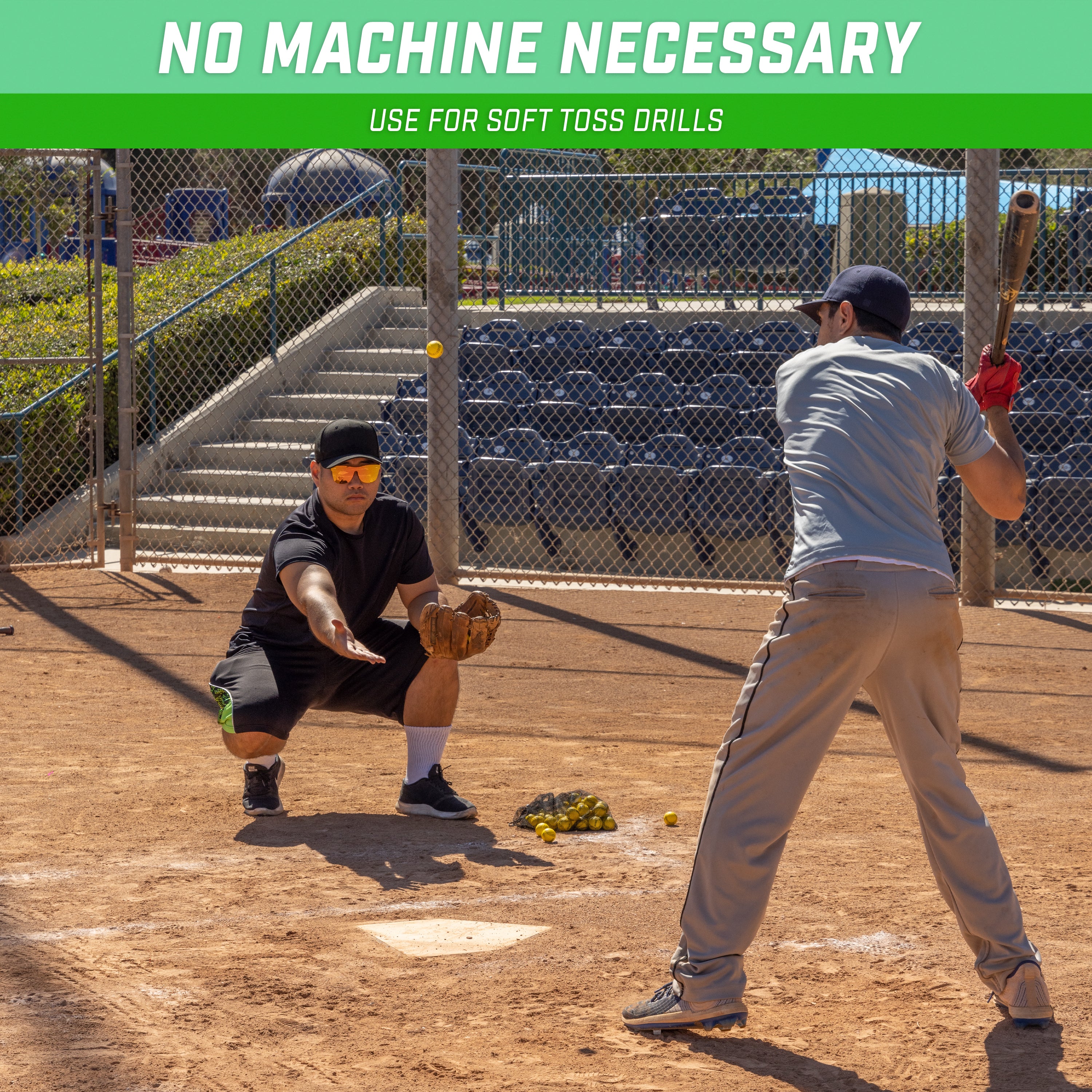 a young boy is swinging a bat at a baseball game