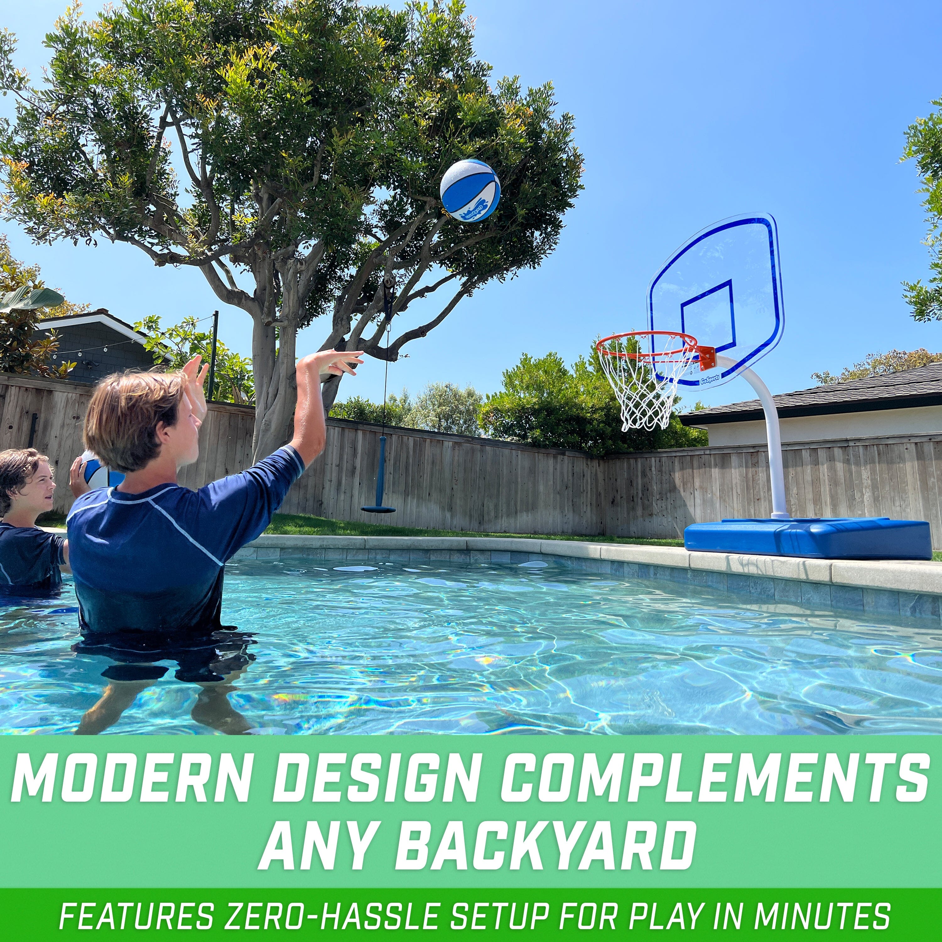 a boy jumping into a pool with a basketball hoop