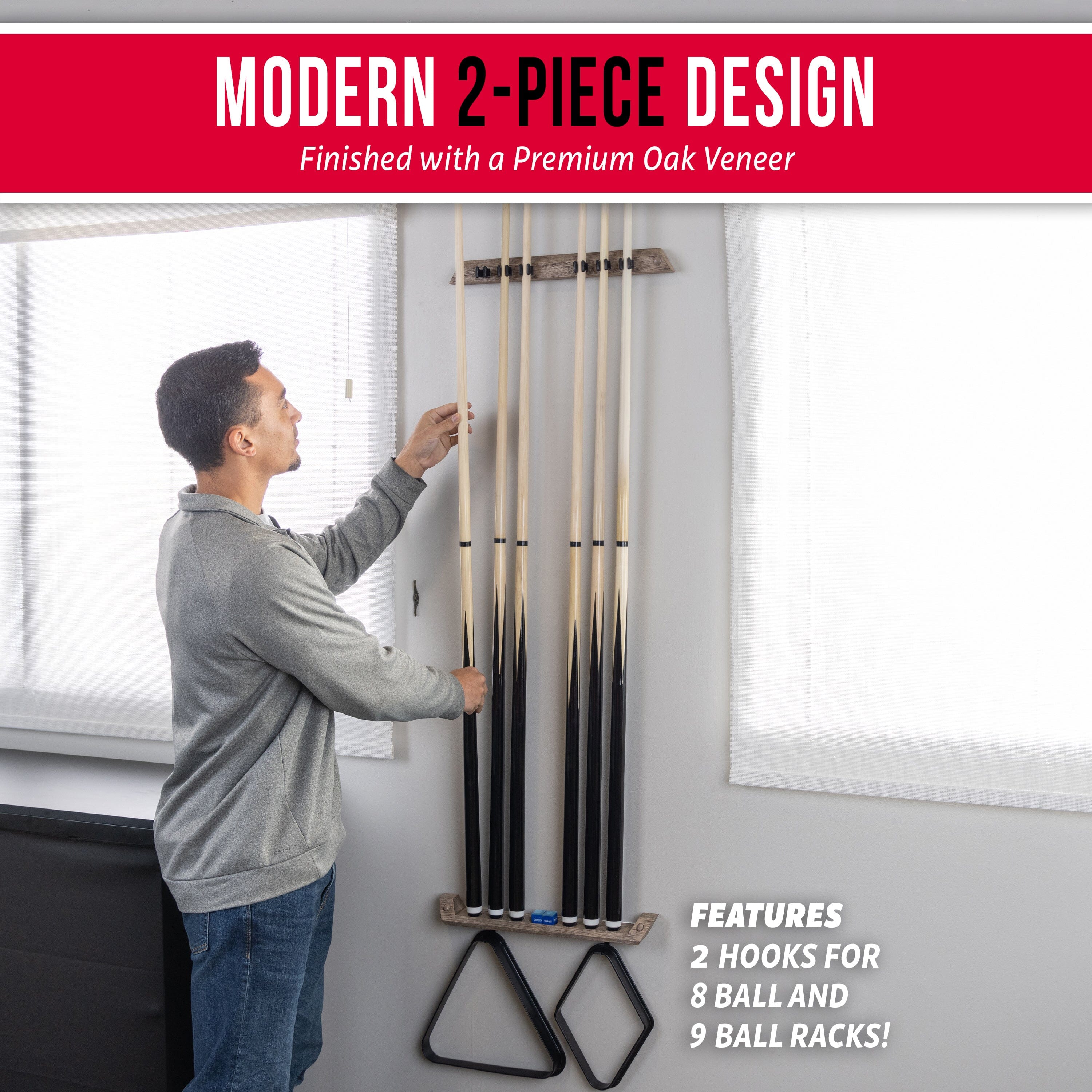 a man is putting a pole to the wall