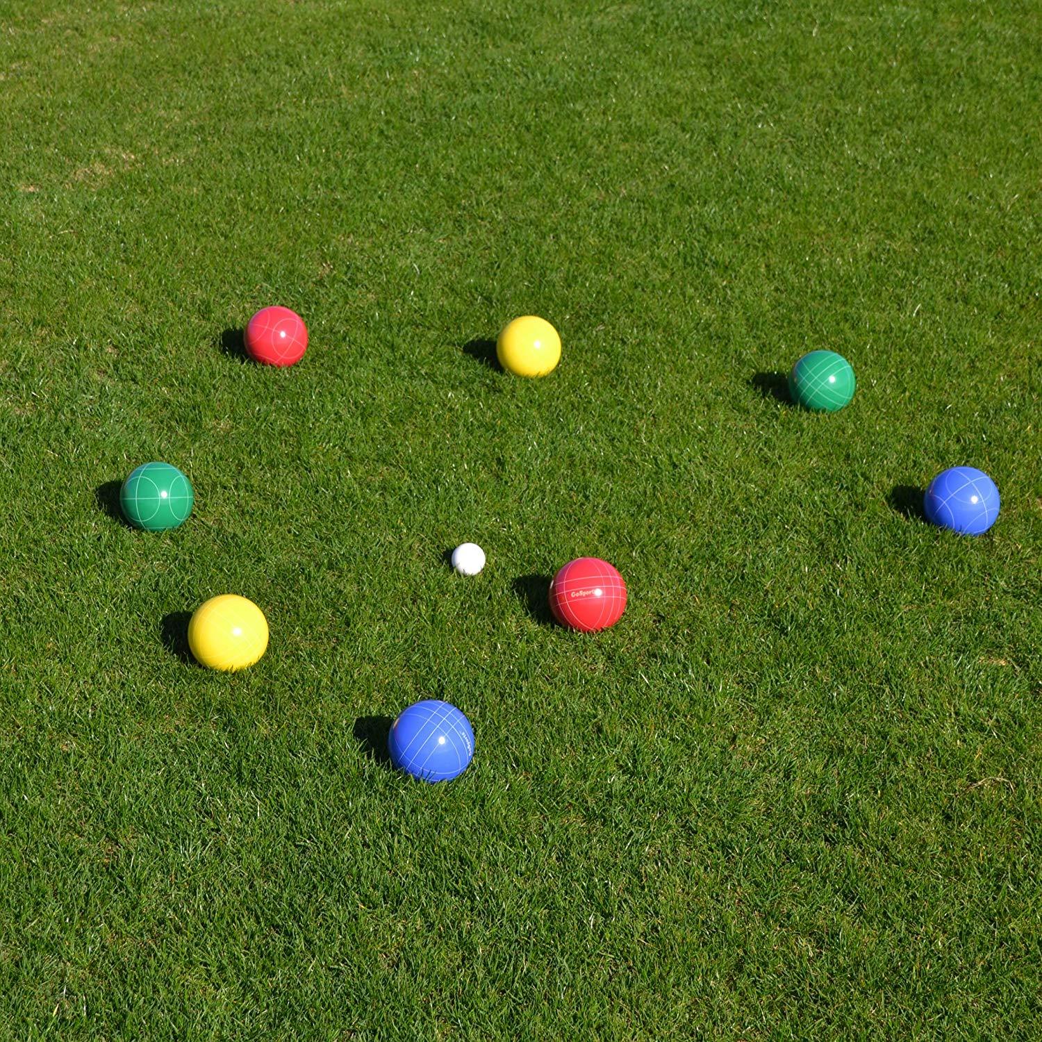 a group of balls on the grass