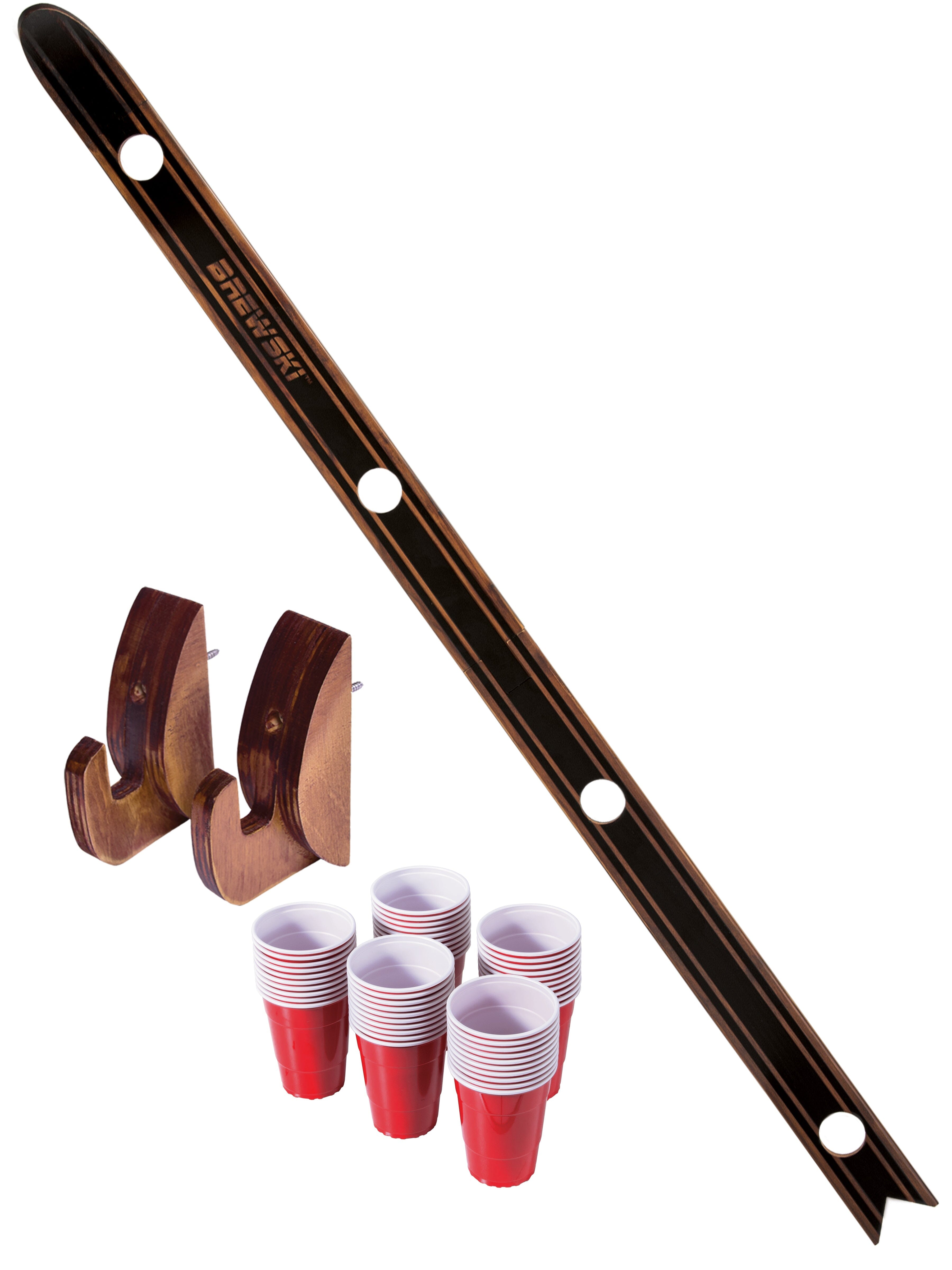 a wooden drinking set with cups and a wooden spoon