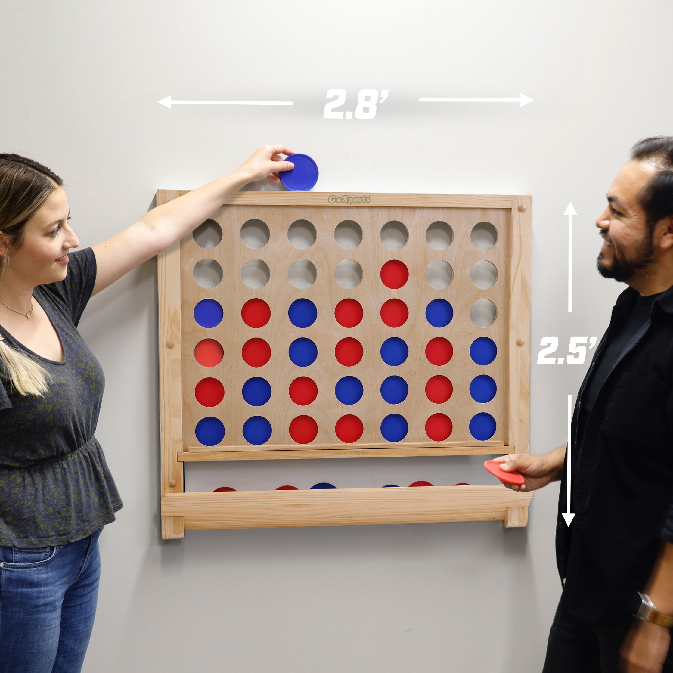 a woman and man playing a game of connect the dots