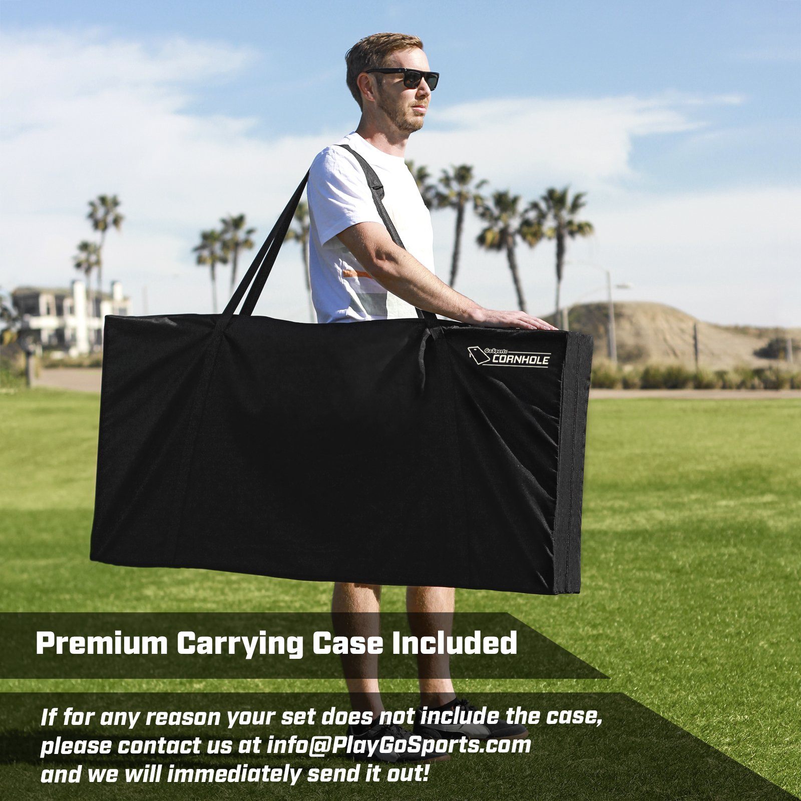 a man carrying a large black bag