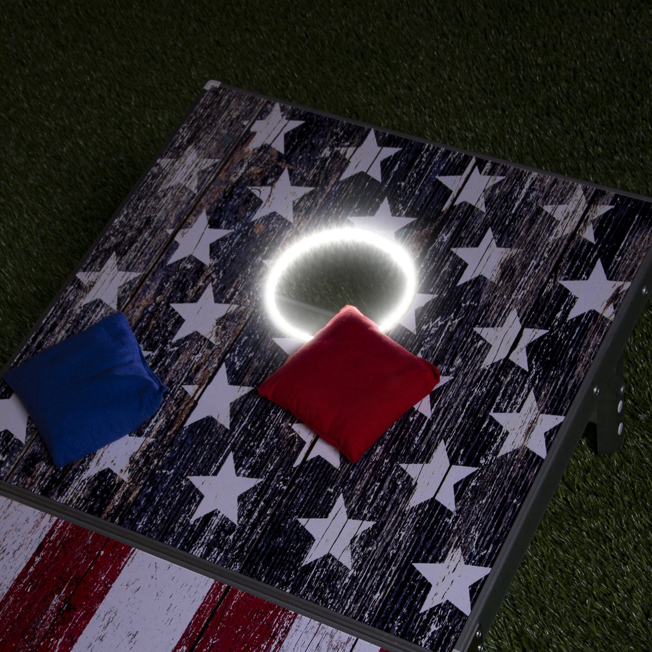 a wooden table with a red, white and blue flag on it