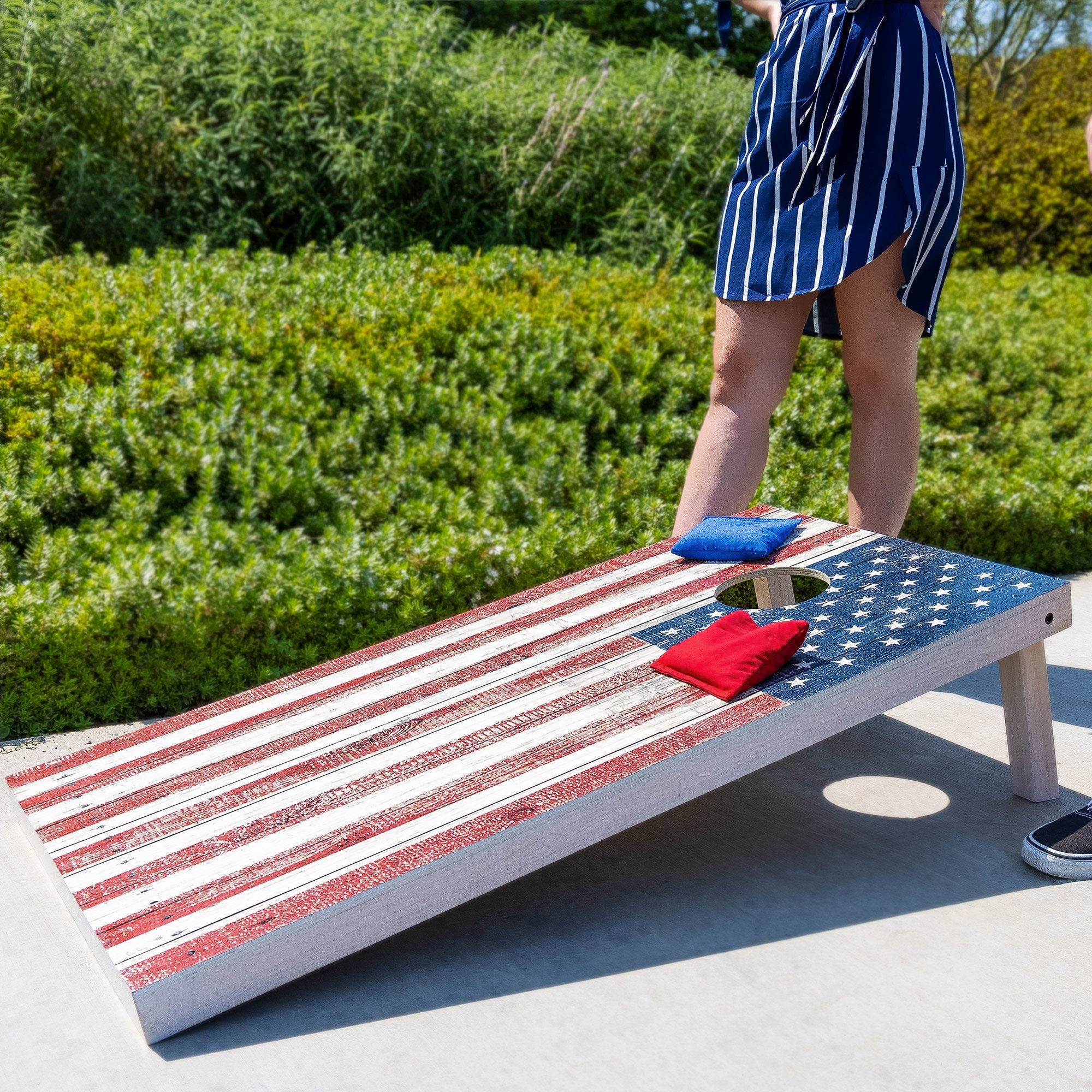 a person standing on a skateboard with a flag on it