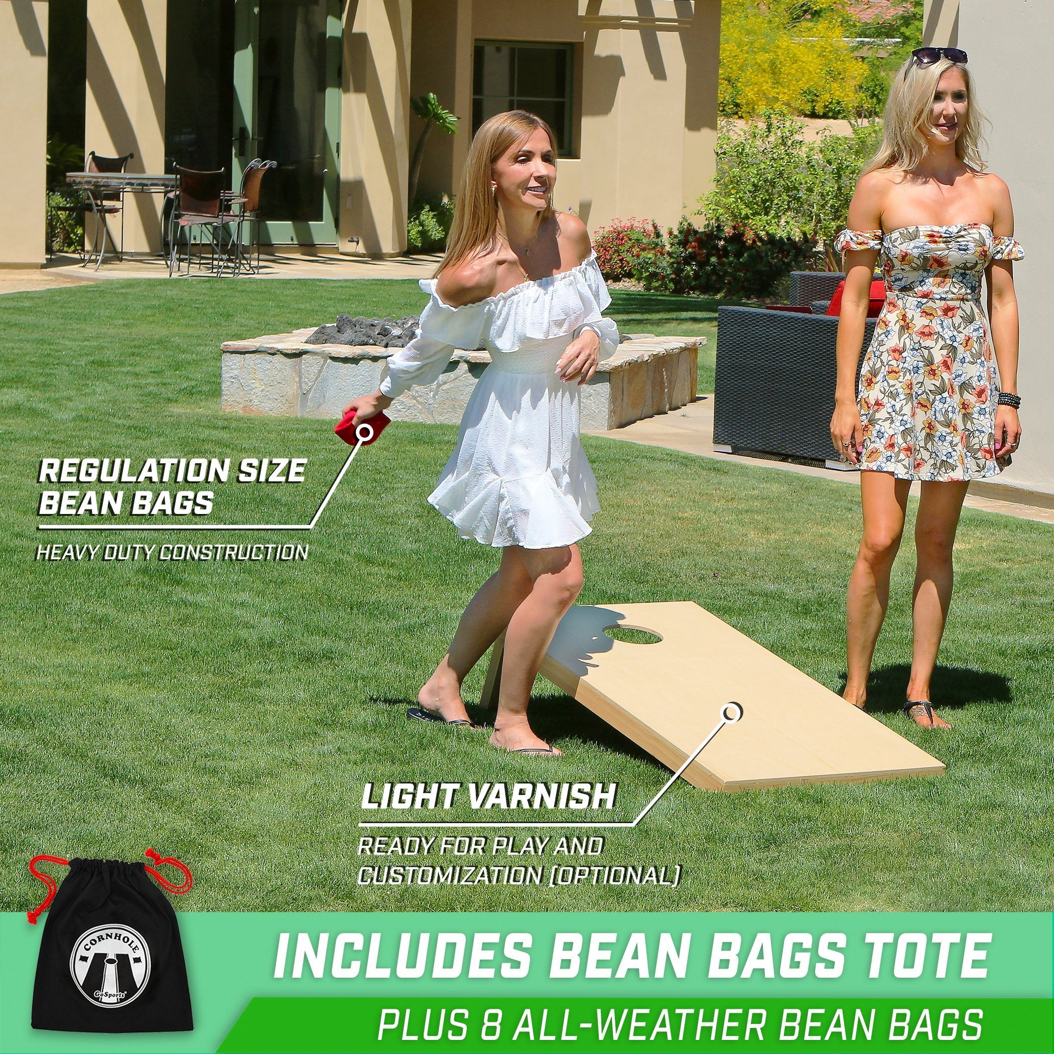 a woman in a dress is playing with a box