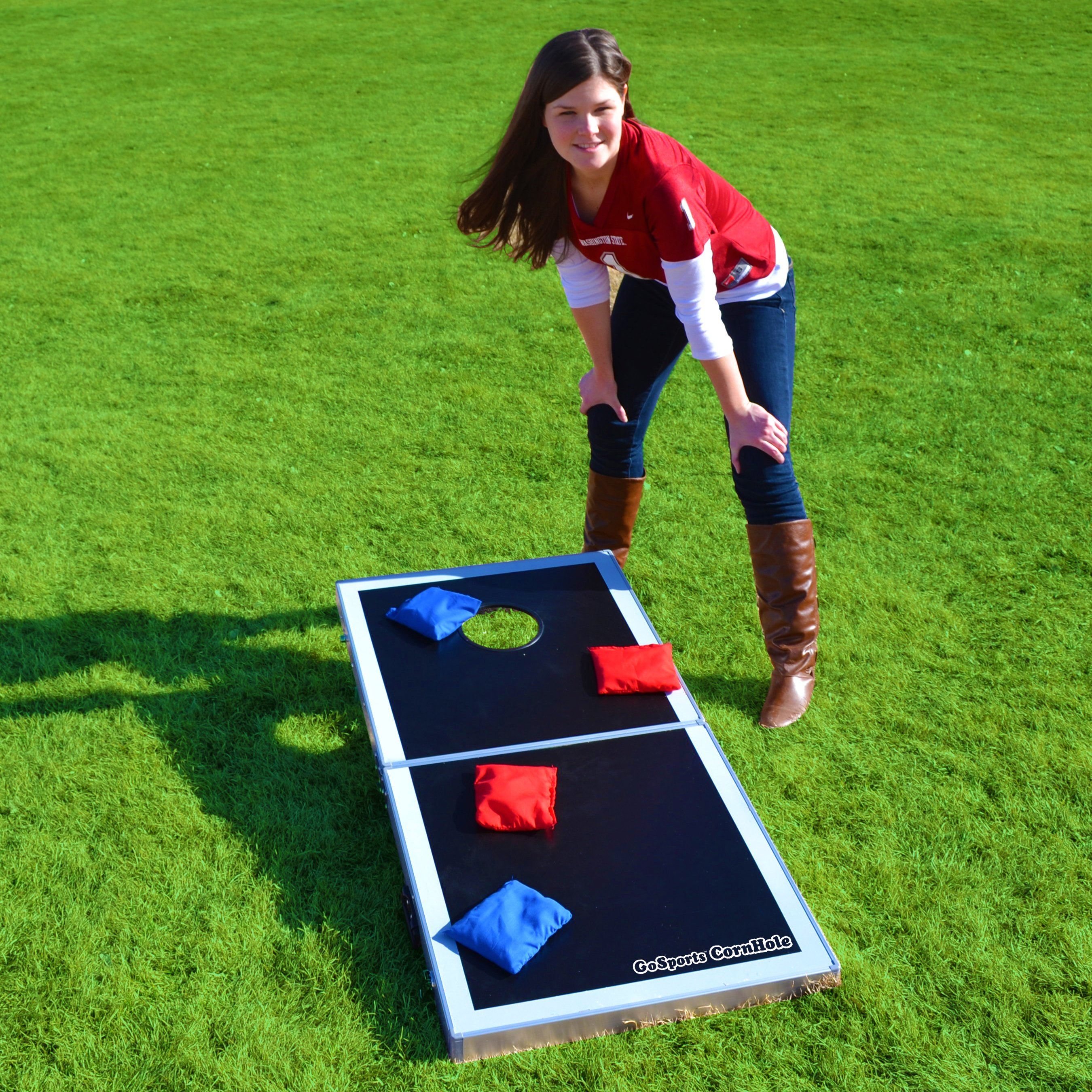 a girl playing corno game on a field
