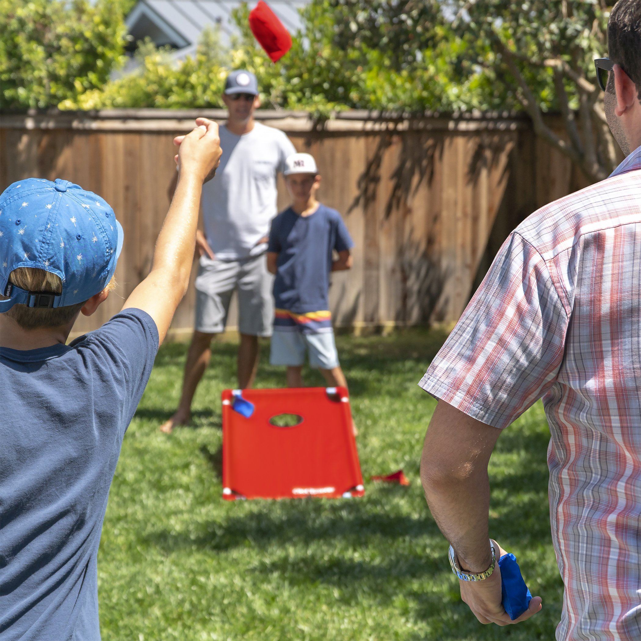 a man and a boy playing with a frc