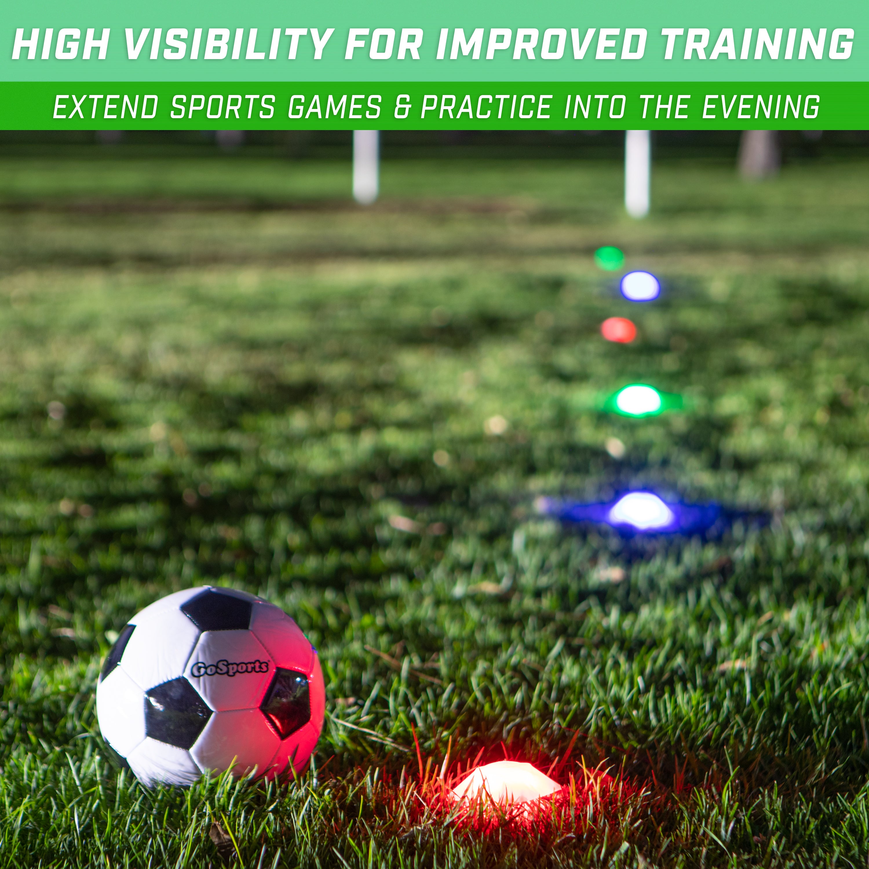 a soccer ball on the grass with a light on it