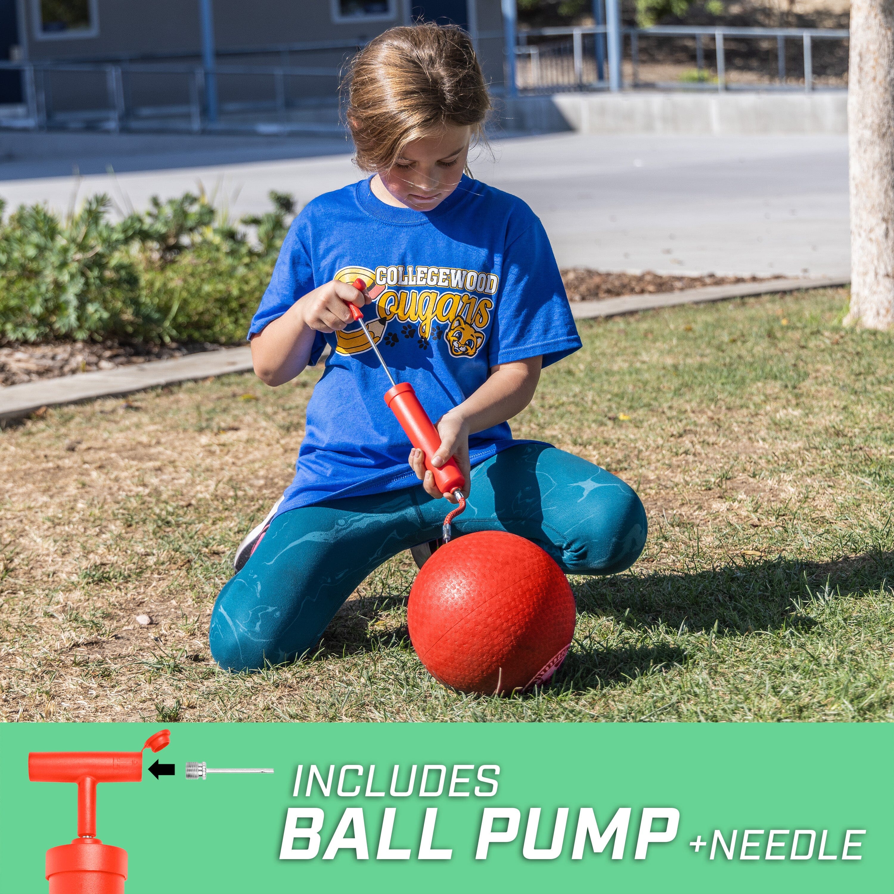 a young boy playing with a ball and a red bat