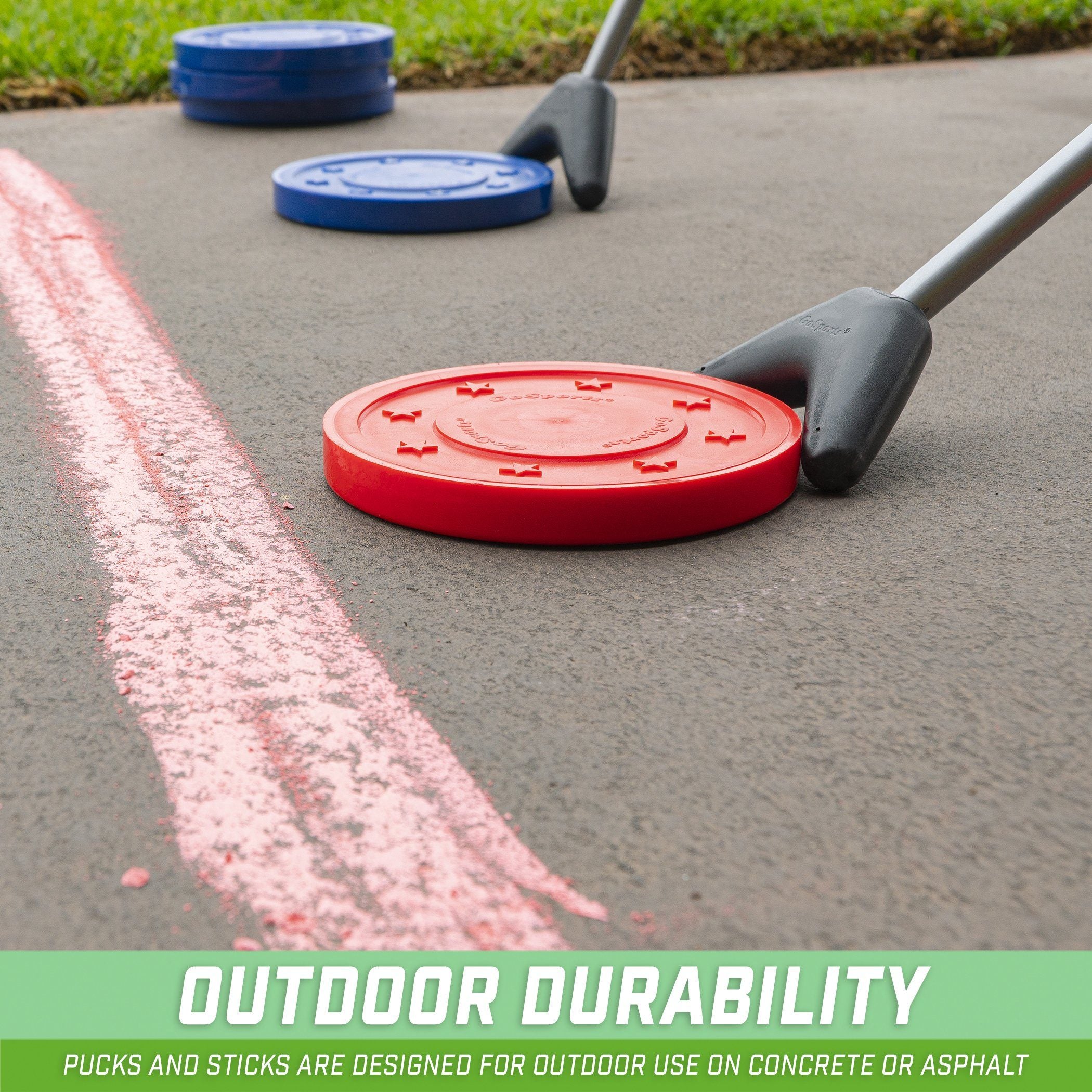 a red and blue plastic object on the ground