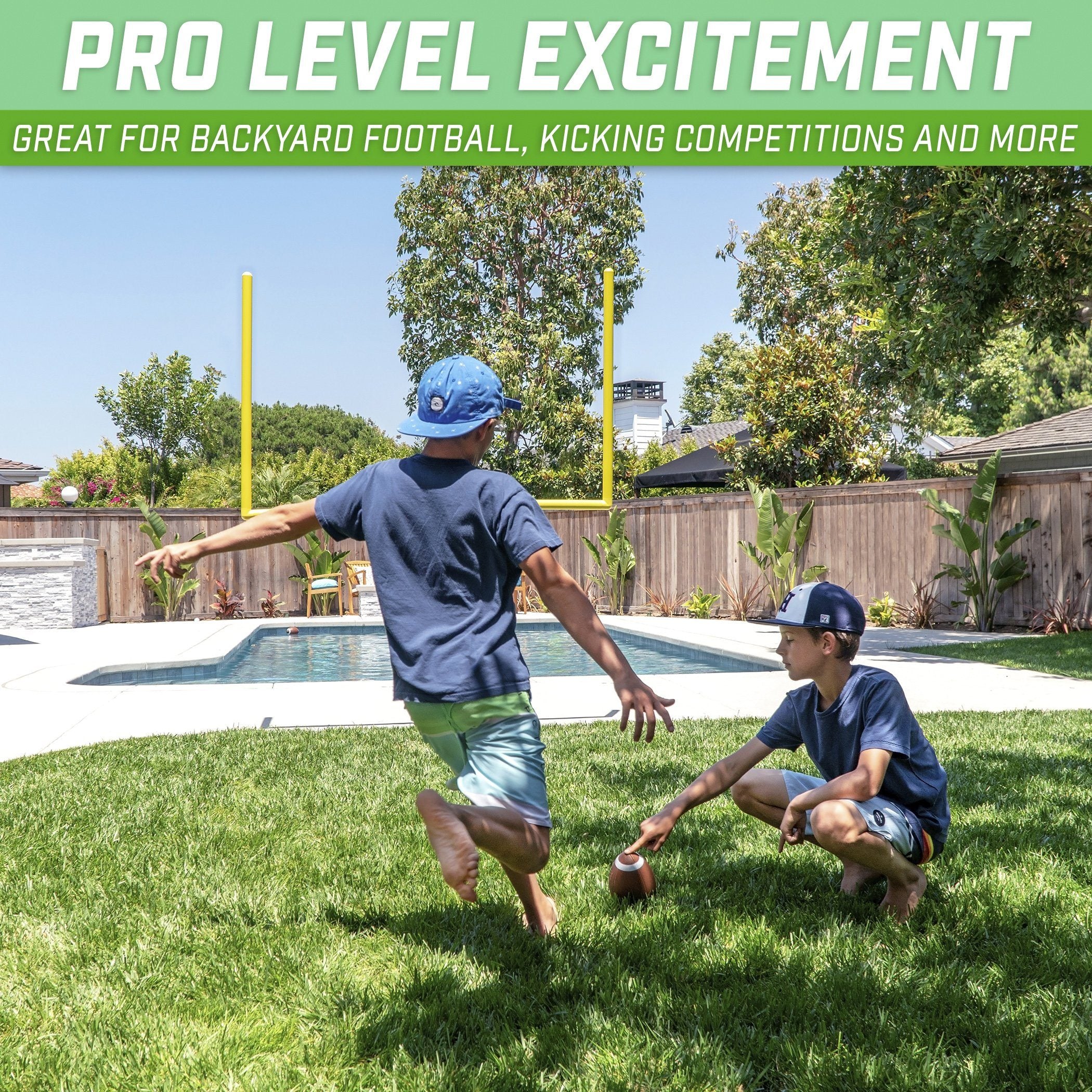 a boy and a boy playing with a ball in the backyard