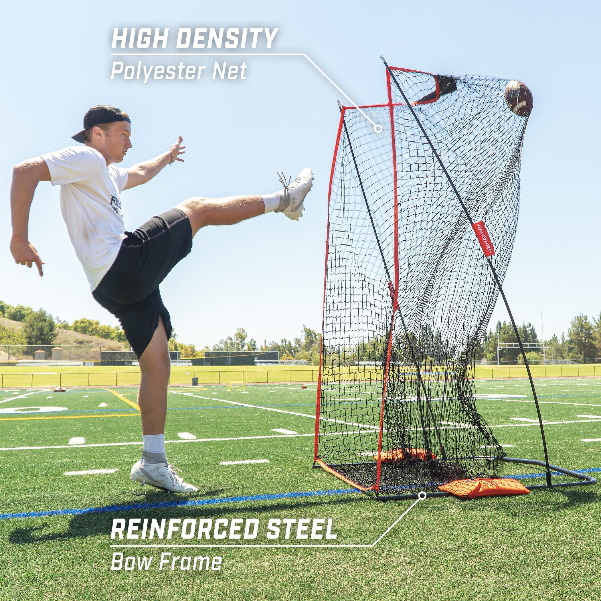 a man kicking a soccer ball on a field