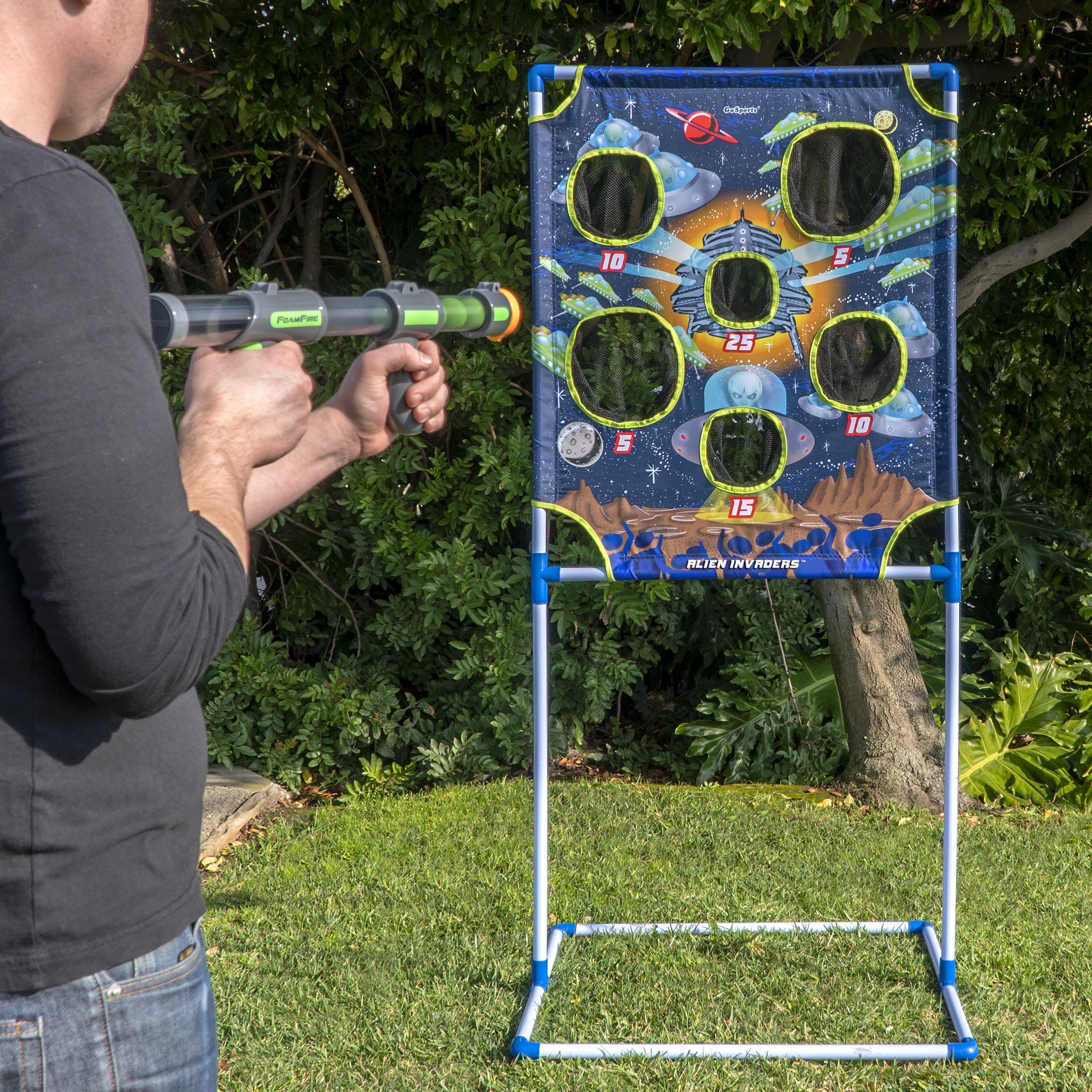 a man is playing with a toy gun