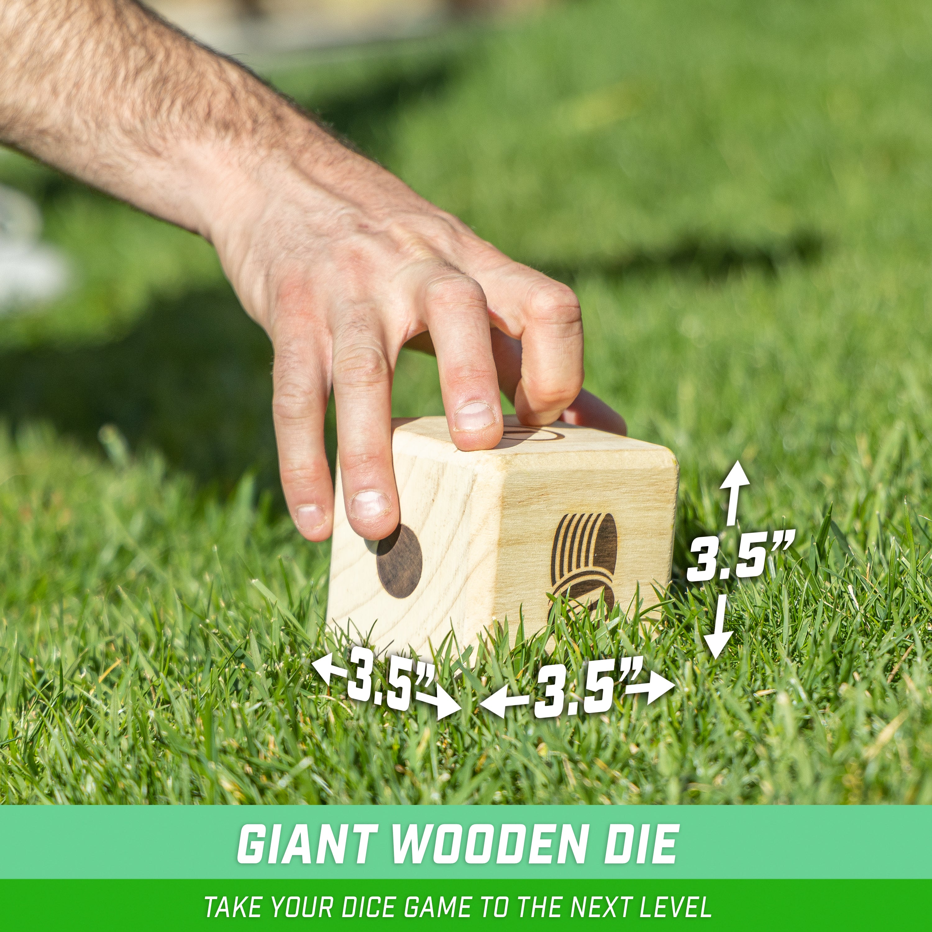 a person is placing a wooden block into the grass