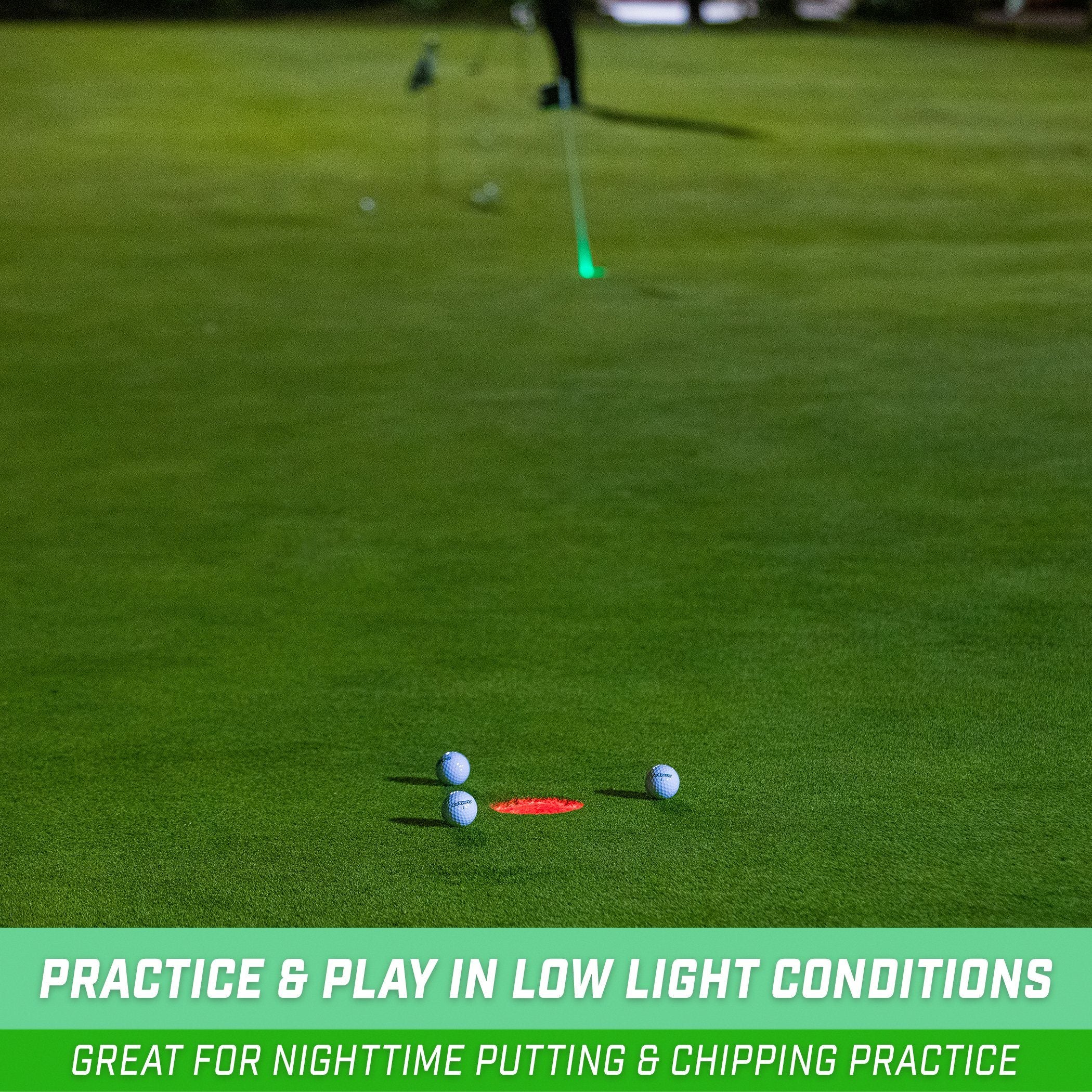 a man is putting a golf ball on the green