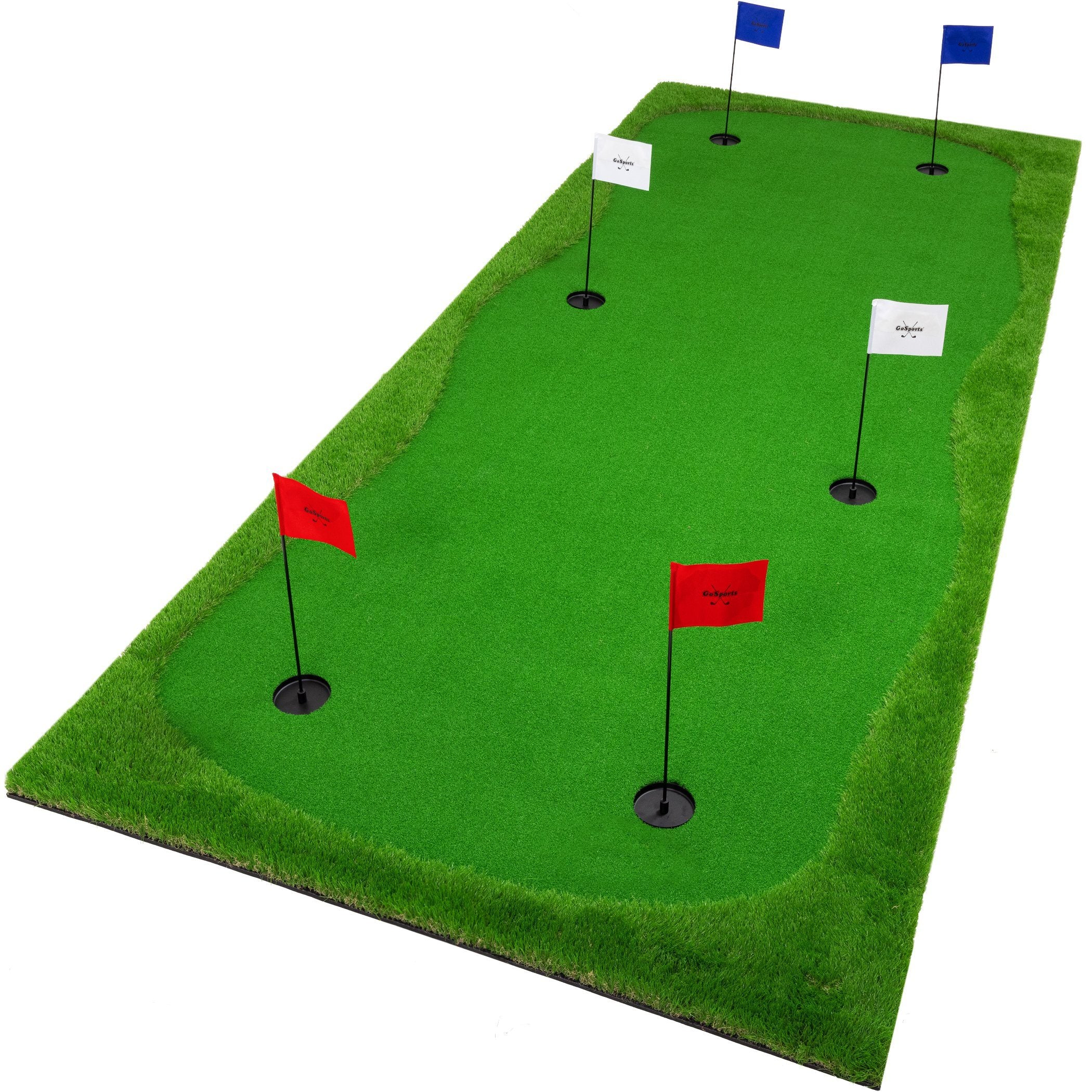 a golf putting mat with two red flags