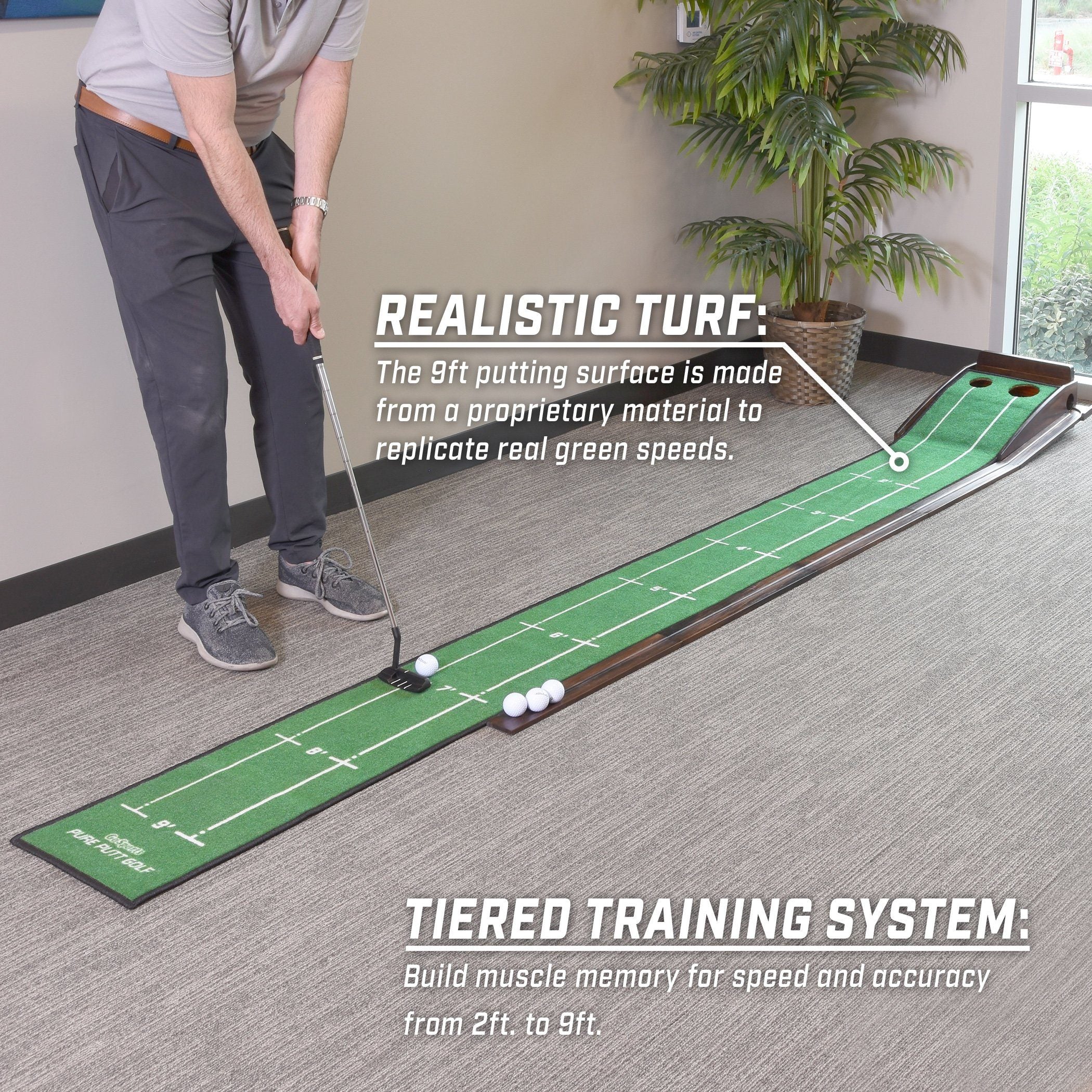 a man putting a golf ball on a putting mat