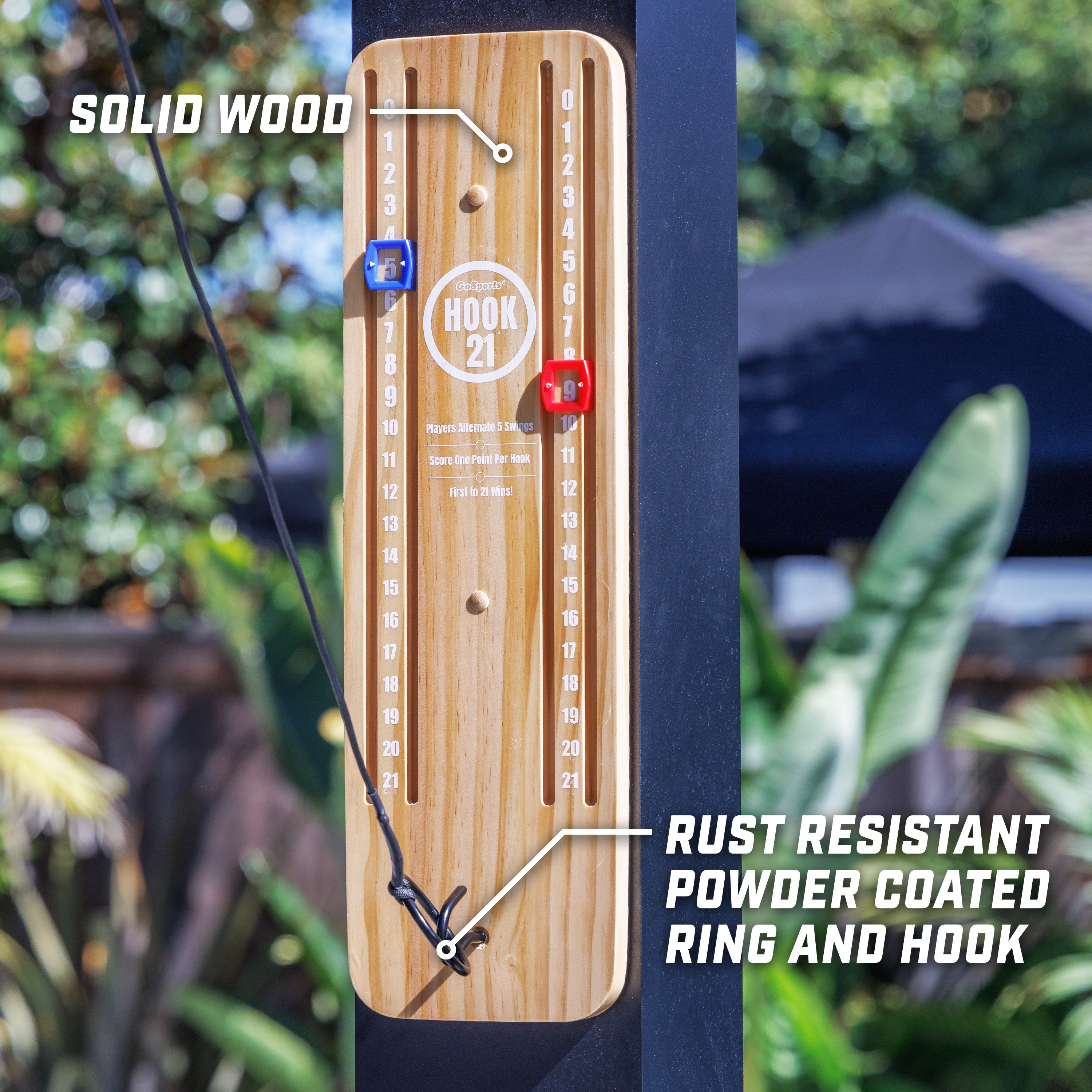 a wooden clock with a red light on it