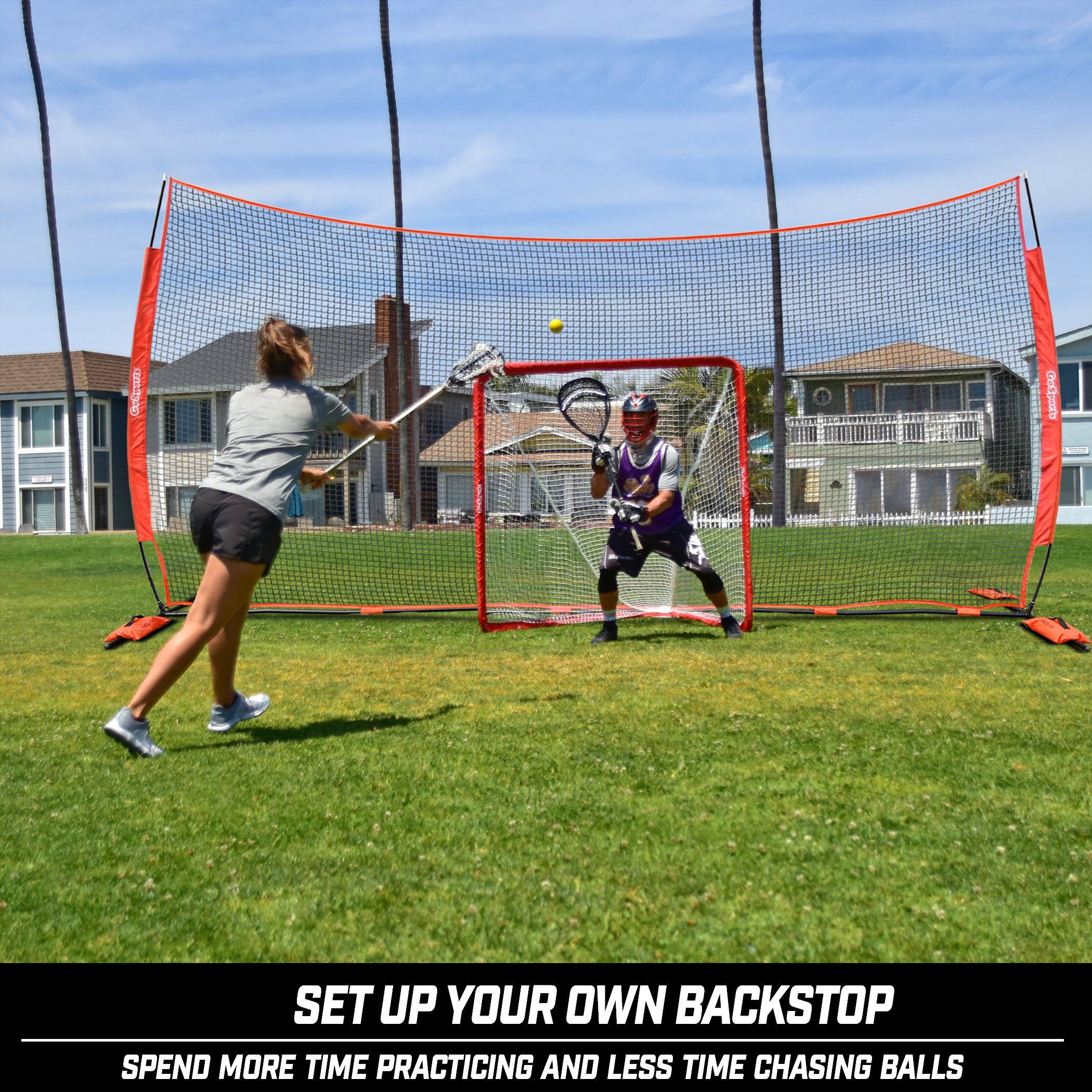 a woman hitting a tennis ball with a racket