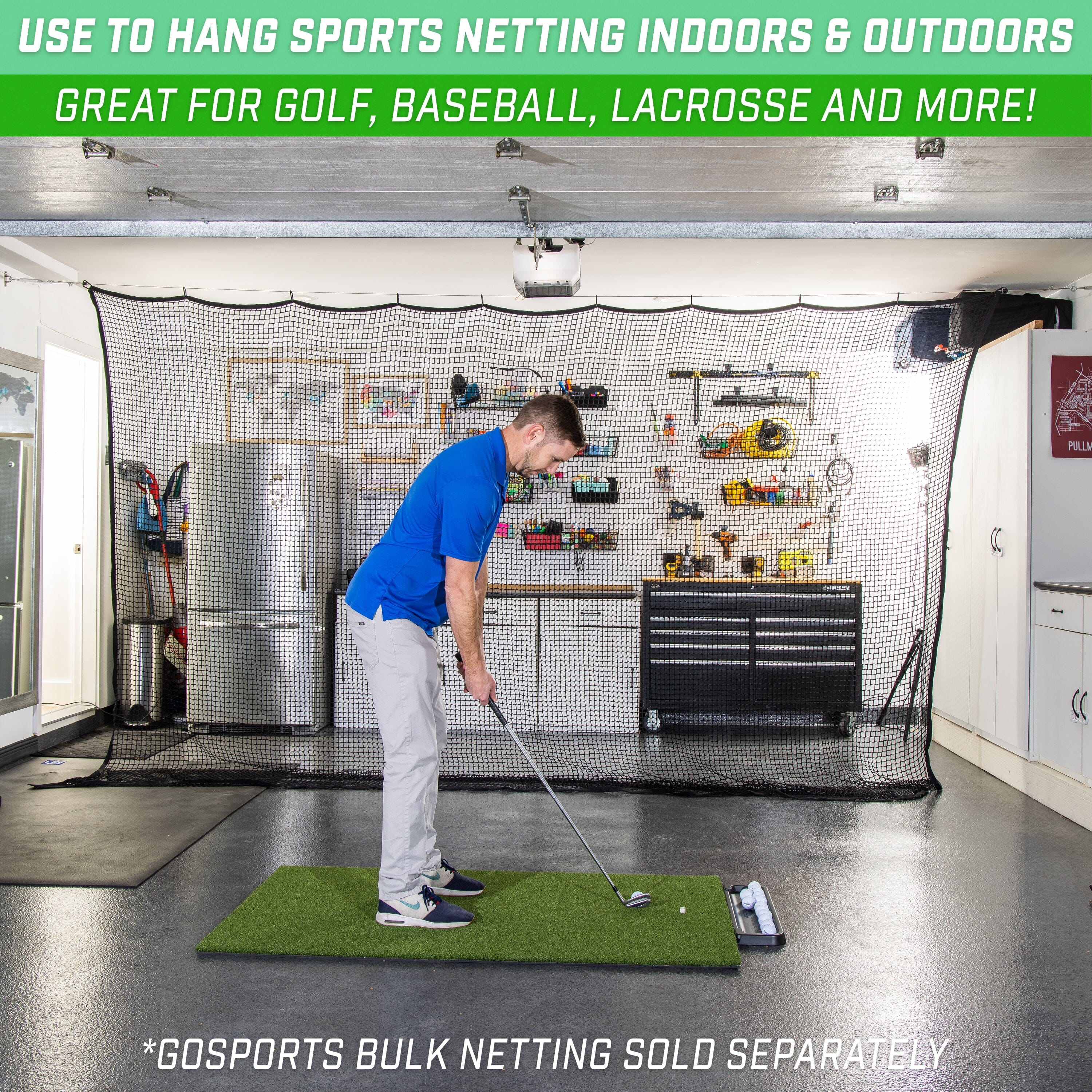 a man is putting a golf ball in a garage