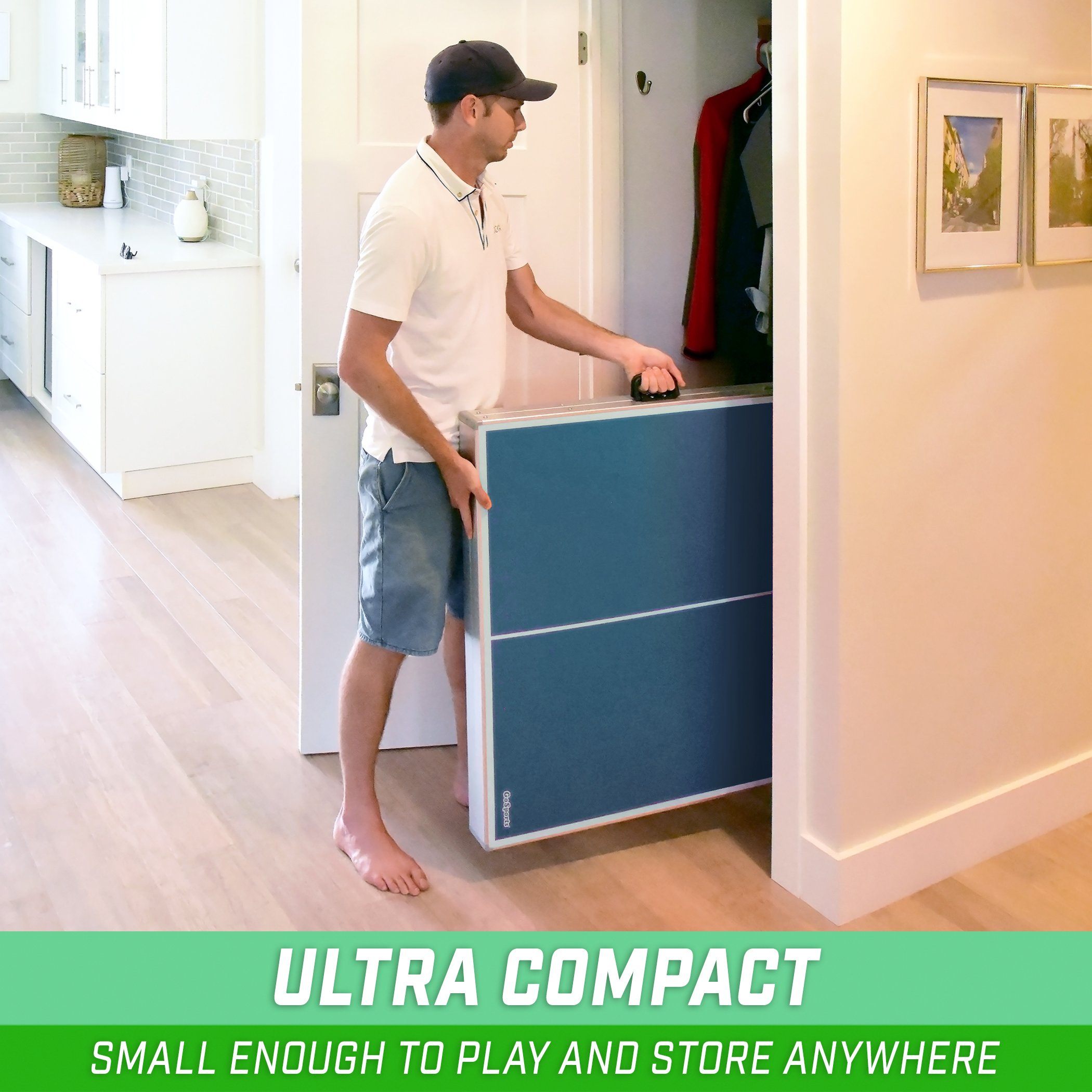 a man is opening a small cabinet in a room