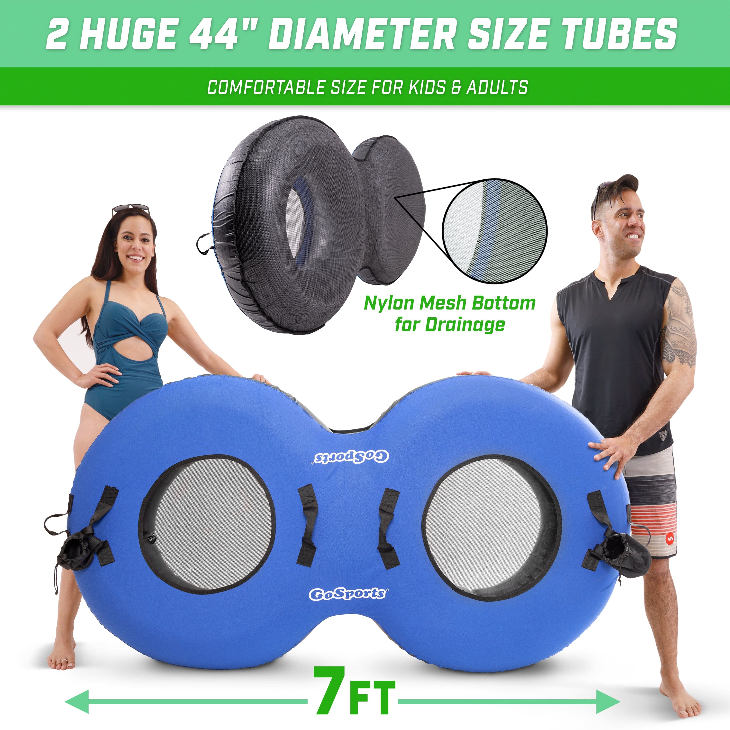 a man and woman standing next to a blue inflatable