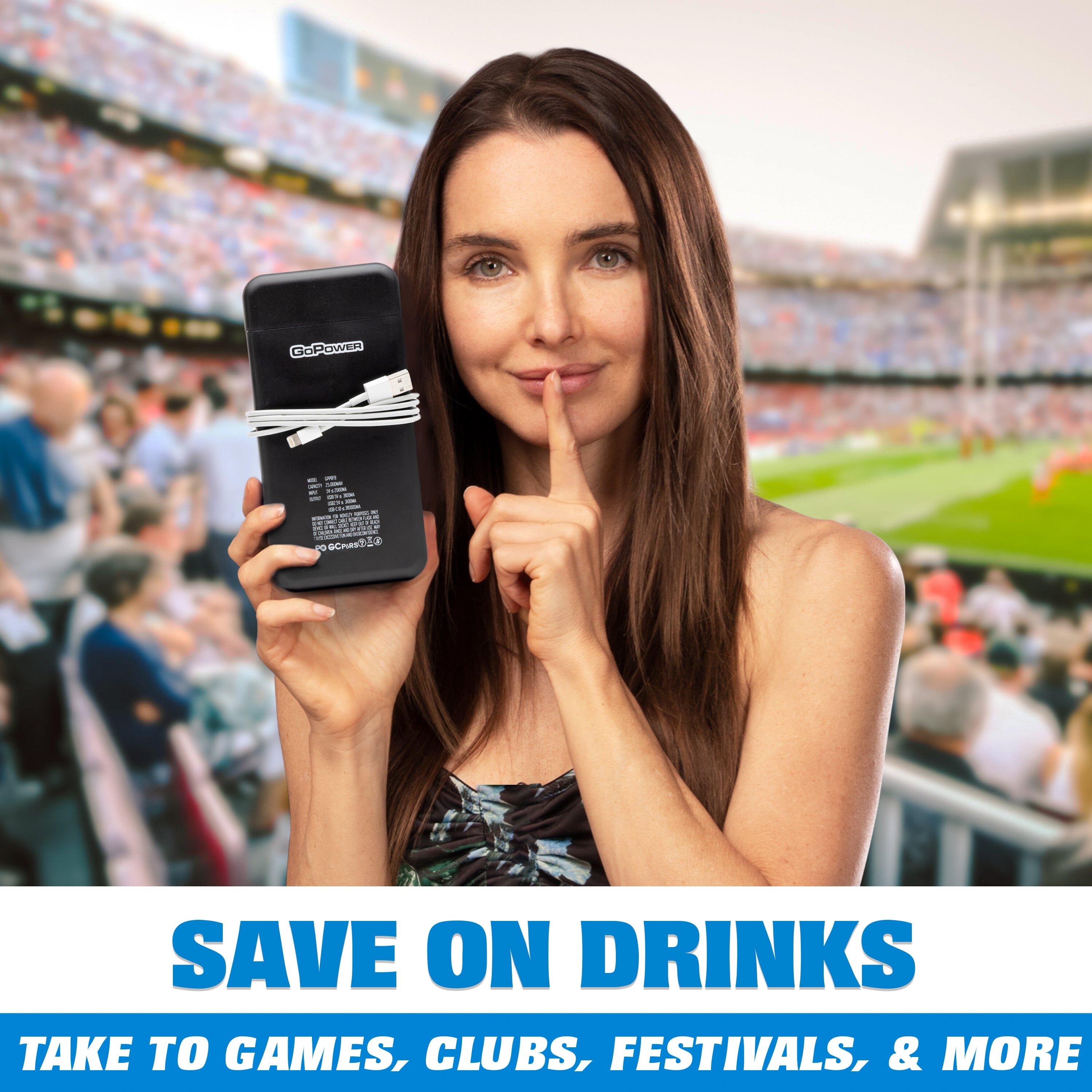 a woman holding a cell phone in front of a crowd